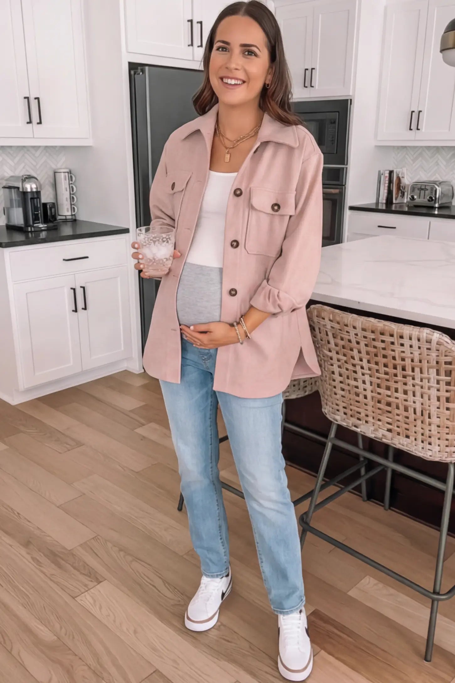 Full Panel Stretch Waistband Straight Leg Maternity Jeans Full Panel Straight Leg Maternity Jeans in light Blue featuring a stretch waistband on a pregnant woman facing front.