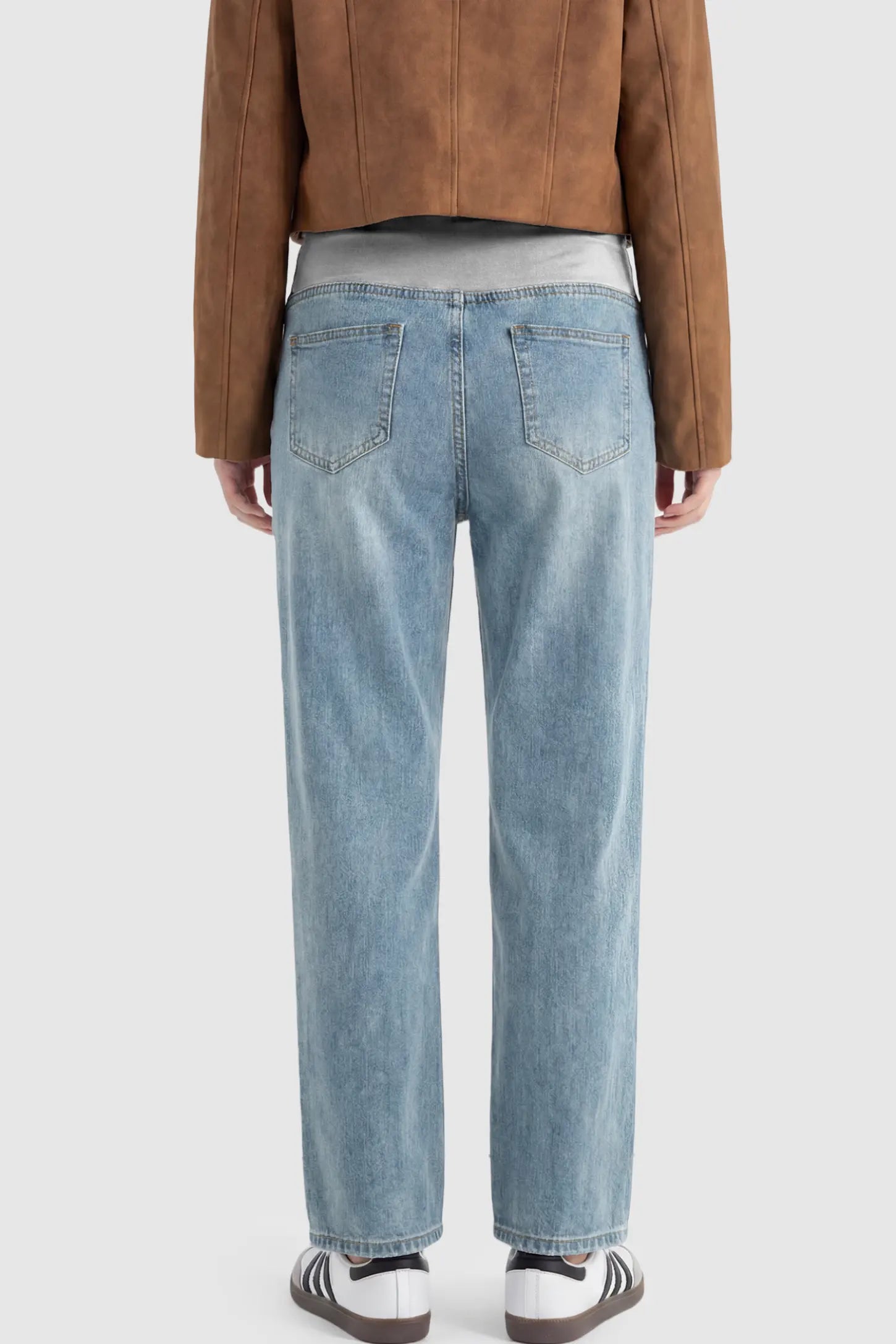 Full Panel Stretch Waistband Straight Leg Maternity Jeans Full Panel Straight Leg Maternity Jeans in light Blue featuring a stretch waistband on a pregnant model showing back.