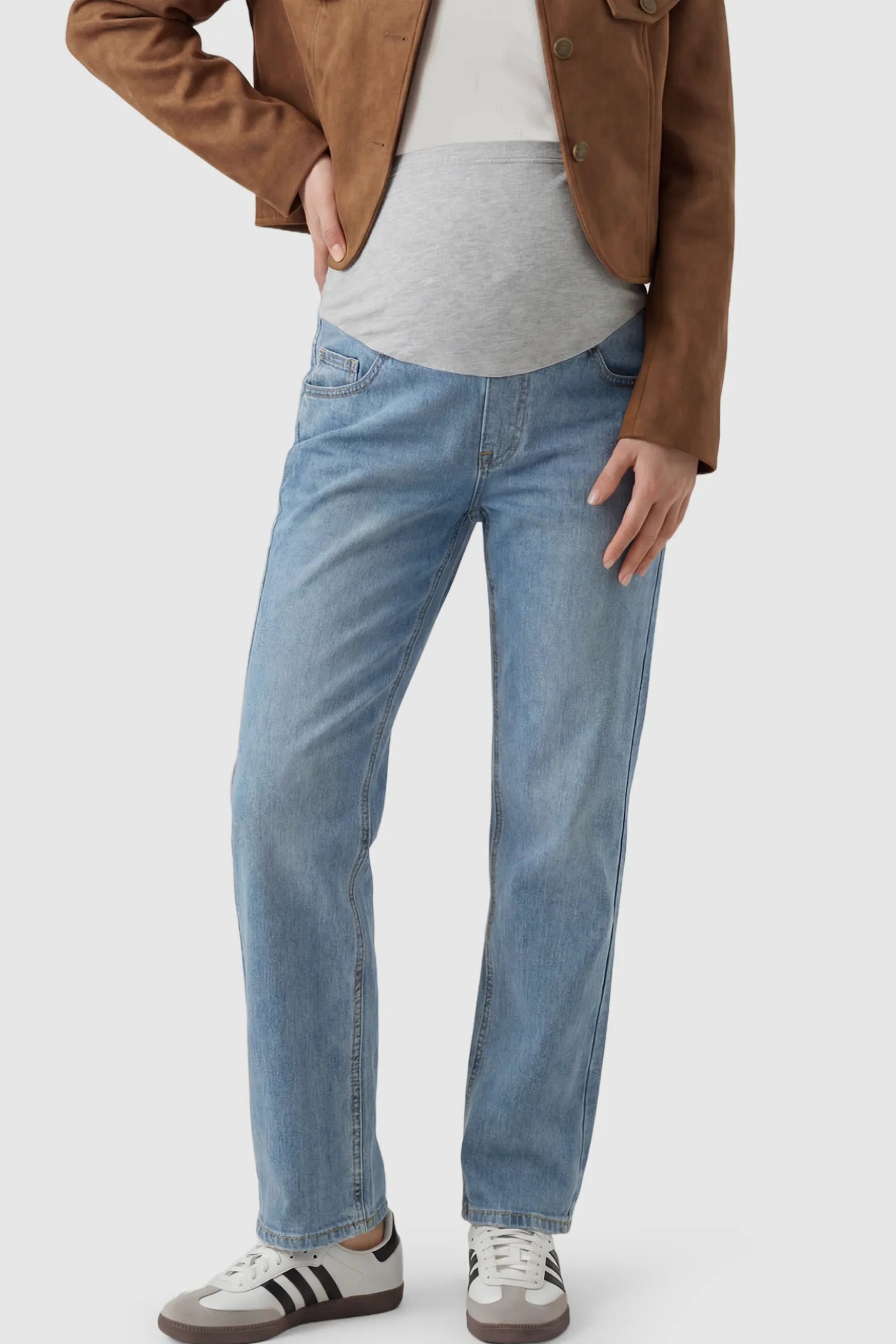 Full Panel Stretch Waistband Straight Leg Maternity Jeans Full Panel Straight Leg Maternity Jeans in light Blue featuring a stretch waistband on a pregnant model showing front.