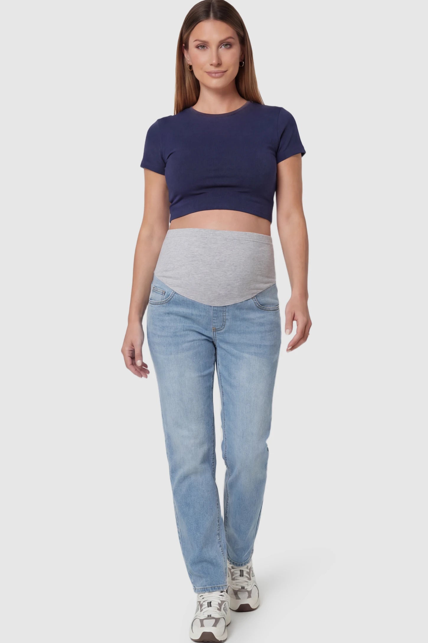 Full Panel Stretch Waistband Straight Leg Maternity Jeans Full Panel Straight Leg Maternity Jeans in light Blue featuring a stretch waistband on a pregnant model facing front.