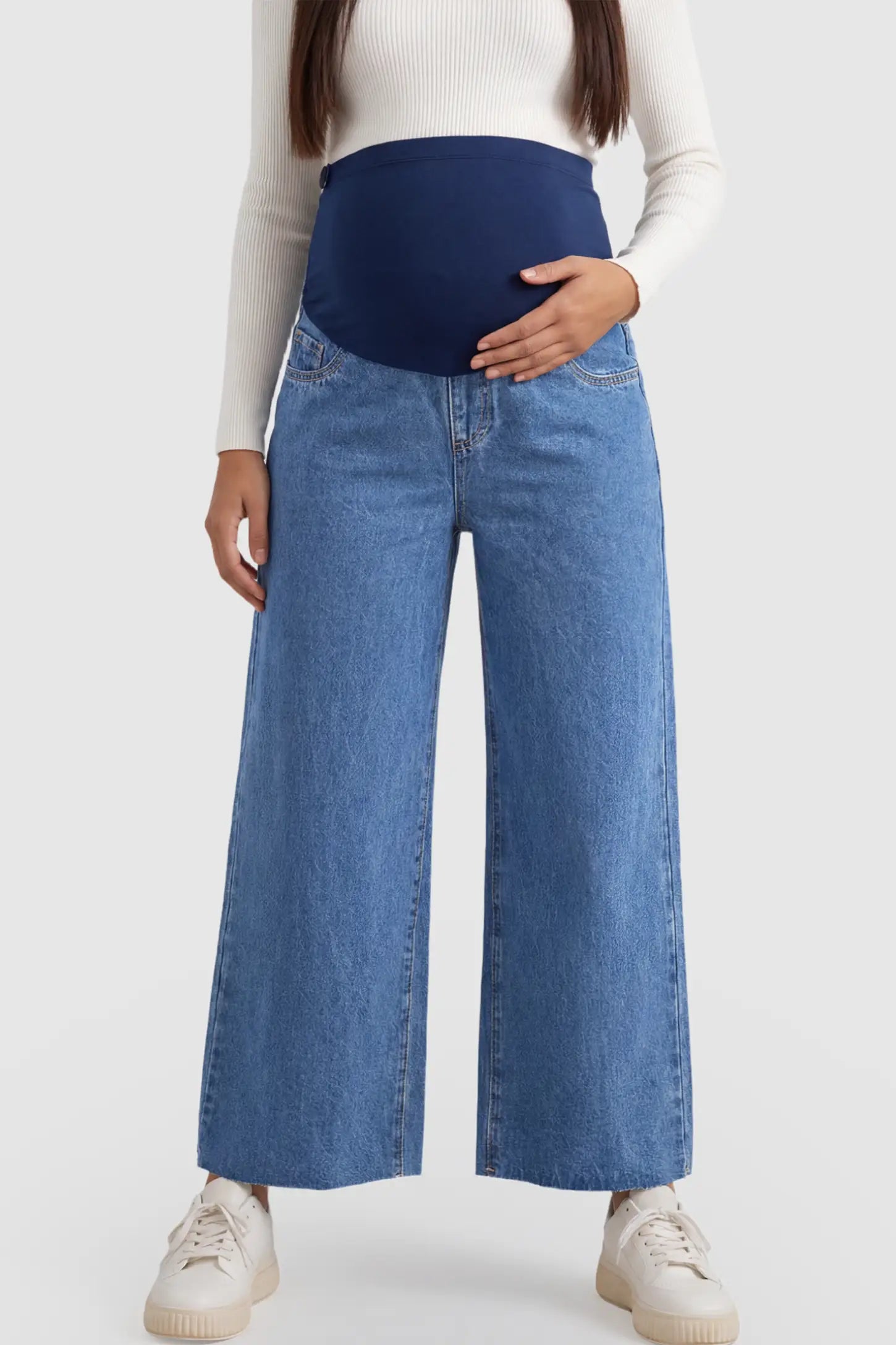Raw Hem Full Panel Wide Leg Maternity Jeans in dark blue featuring a high-rise navy belly band on a pregnant model.
