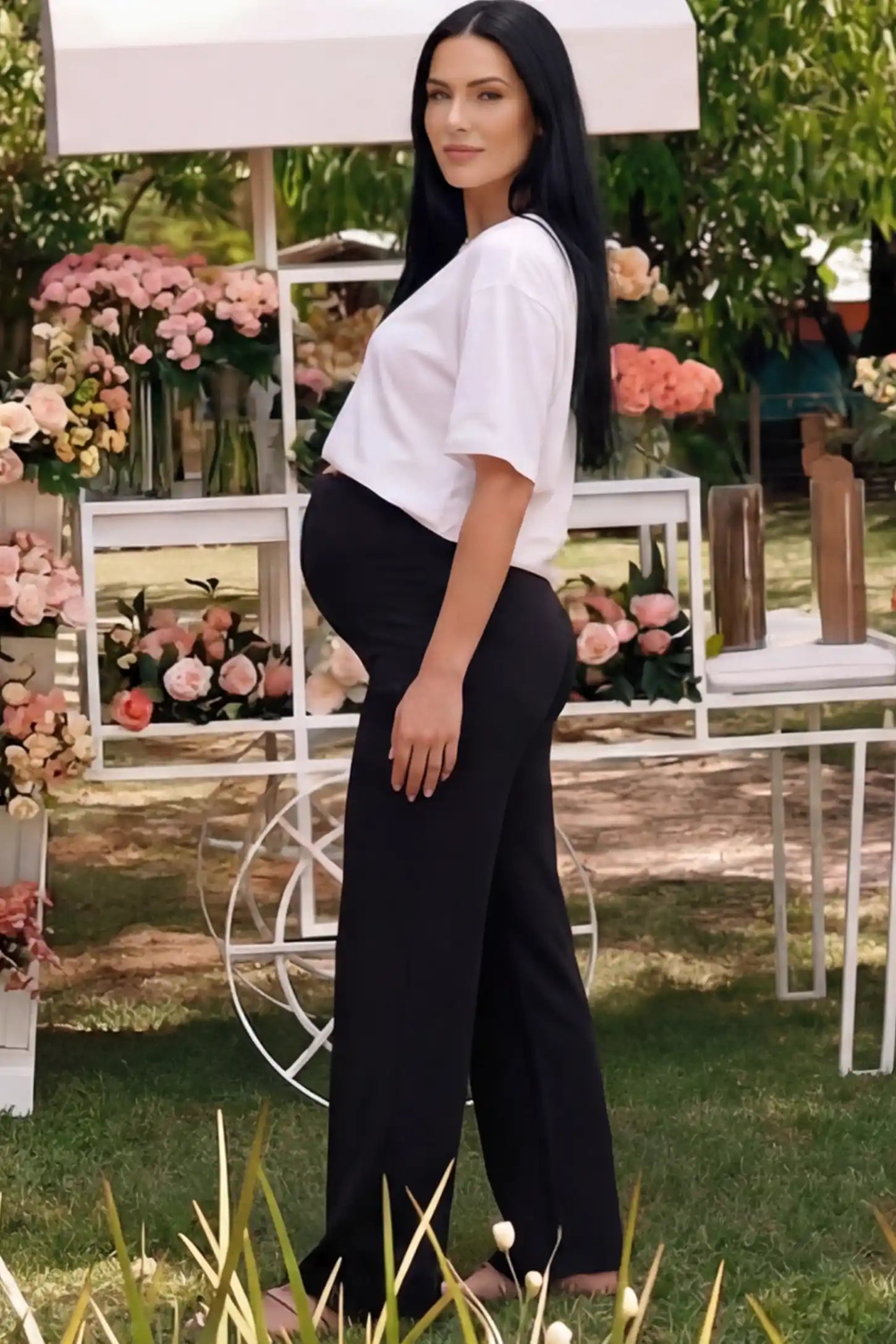 High Waisted Full Panel Wide Leg Maternity Pants High Waisted Full Panel Wide Leg Maternity Pants in Black featuring a stretch waistband on a pregnant woman.
