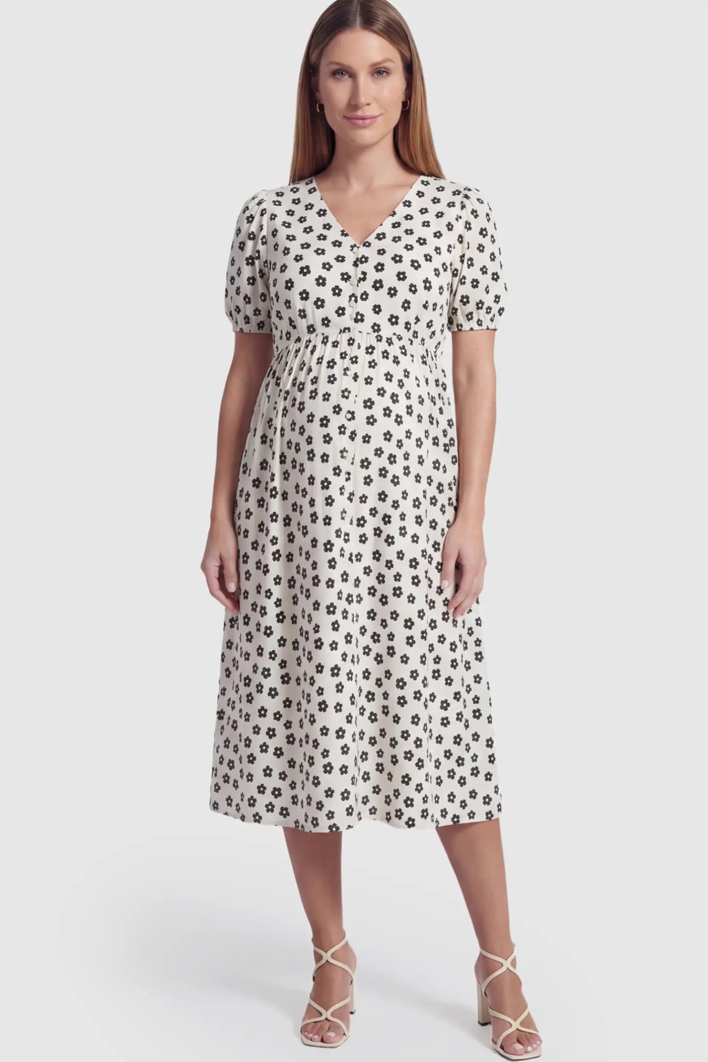 Floral V-Neck Short Sleeve Maternity Nursing Dress Floral Print V-Neck Maternity Nursing Dress in Black featuring functional button-front details on a pregnant model.