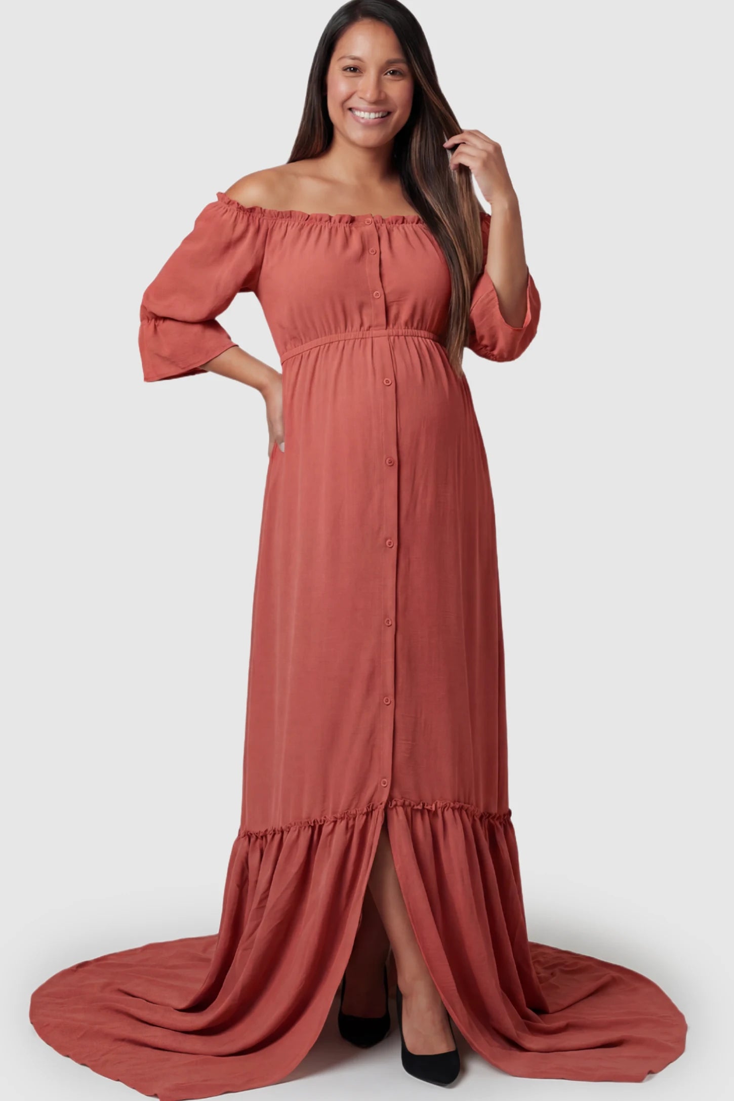 Linen-Blend Button Down Off Shoulder Maternity Maxi Dress Linen-Blend Off-the-Shoulder Maternity Maxi Dress in Pink featuring a button-down front on a pregnant model.