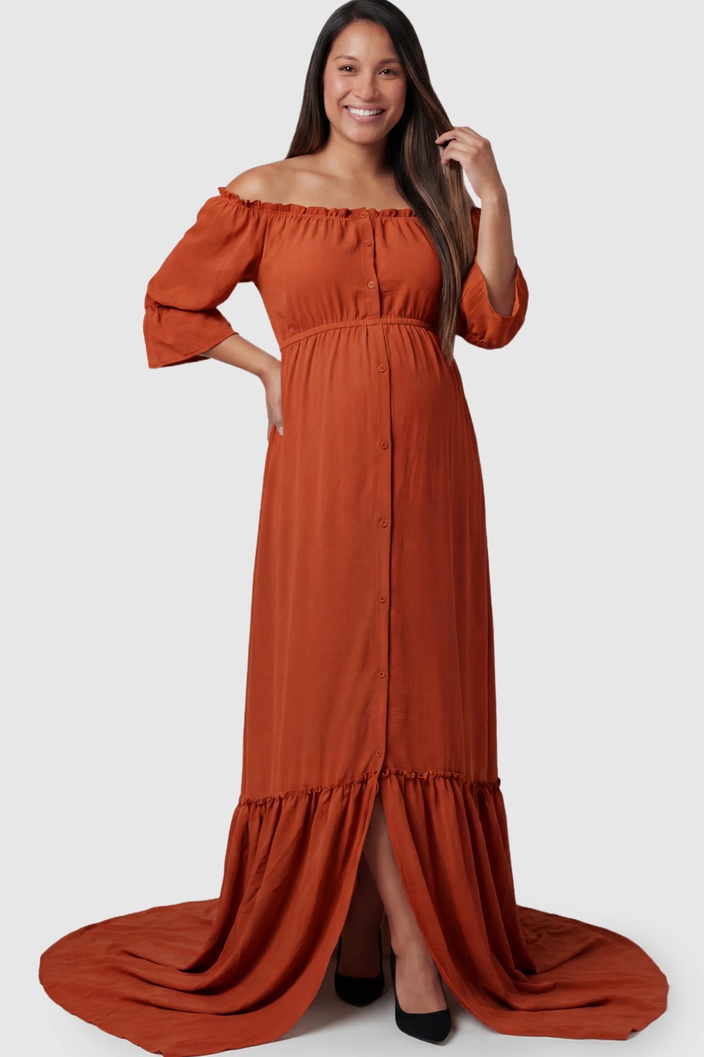 Linen-Blend Off-the-Shoulder Maternity Maxi Dress in Orange featuring a button-down front on a pregnant model.