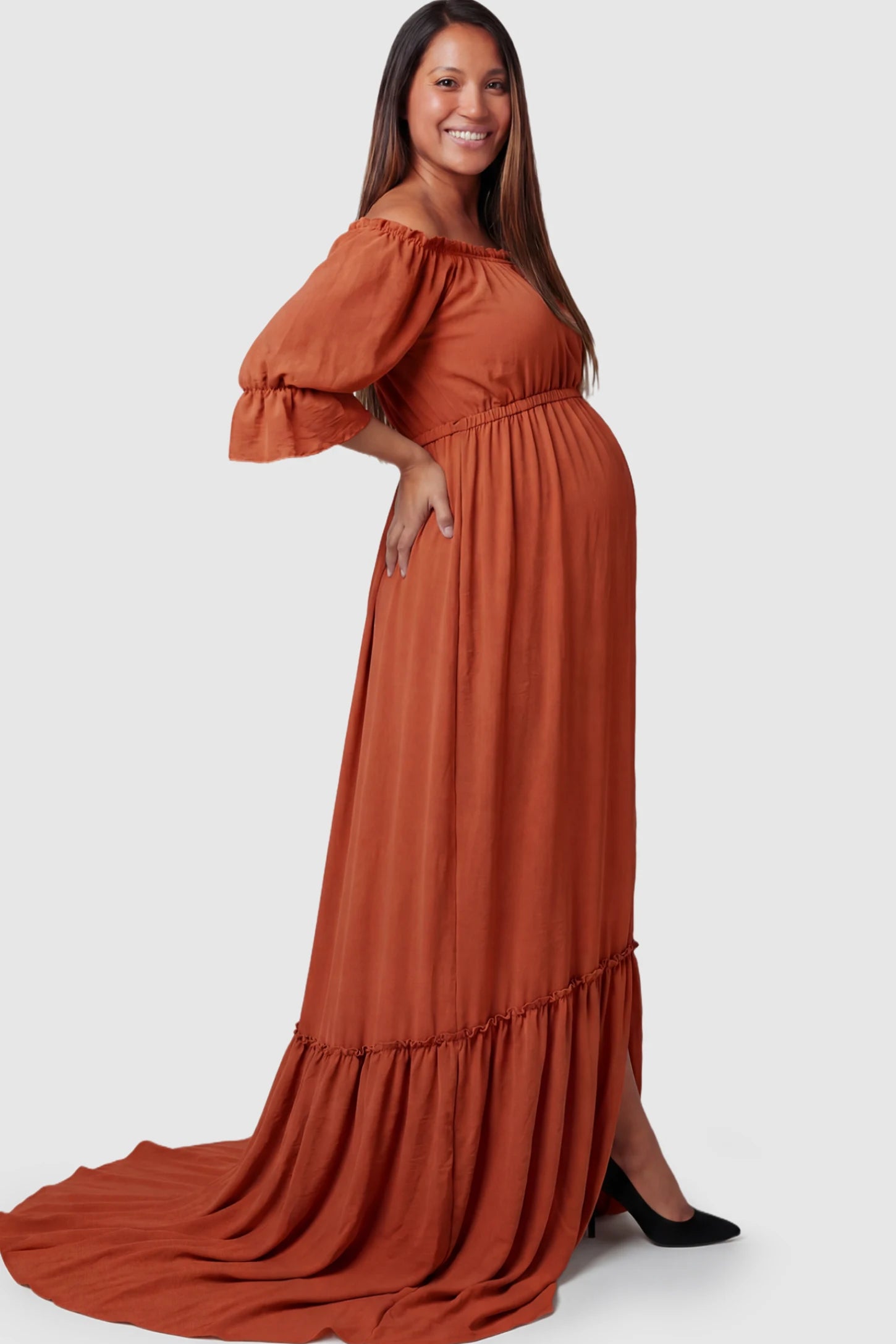 Linen-Blend Off-the-Shoulder Maternity Maxi Dress in Orange featuring a button-down front on a pregnant model.