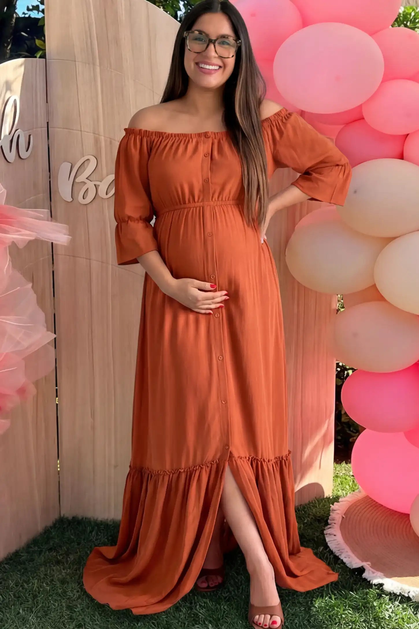 Linen-Blend Button Down Off Shoulder Maternity Maxi Dress Linen-Blend Off-the-Shoulder Maternity Maxi Dress in Orange featuring a button-down front on a pregnant model.
