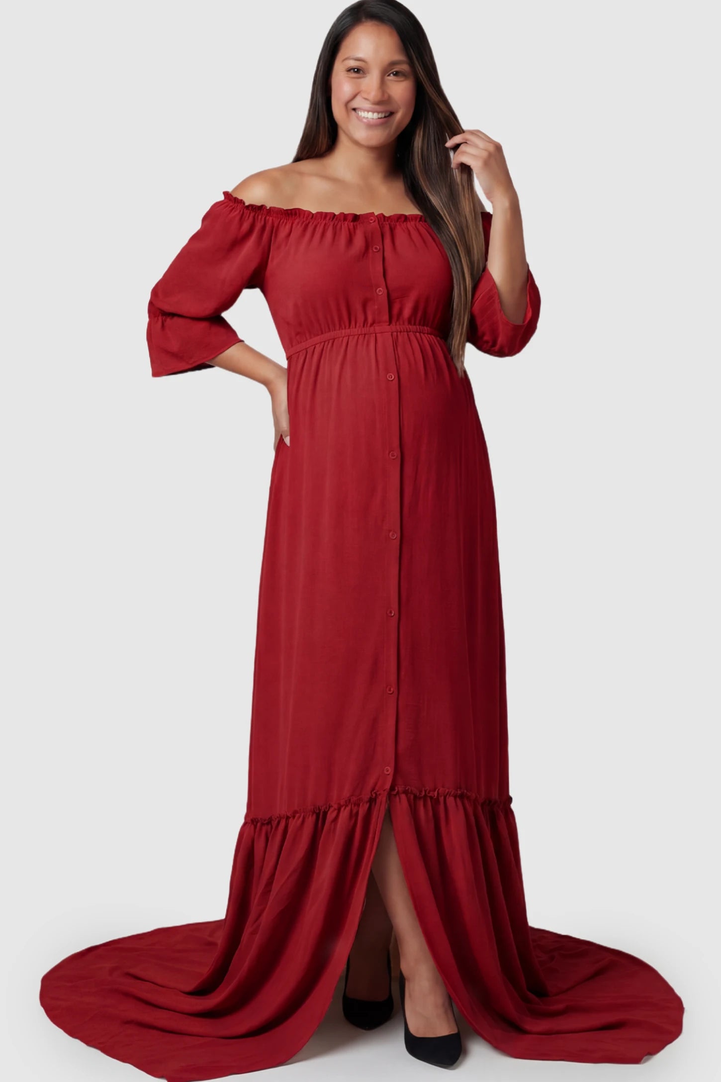 Linen-Blend Button Down Off Shoulder Maternity Maxi Dress Linen-Blend Off-the-Shoulder Maternity Maxi Dress in Wine Red featuring a button-down front on a pregnant model.