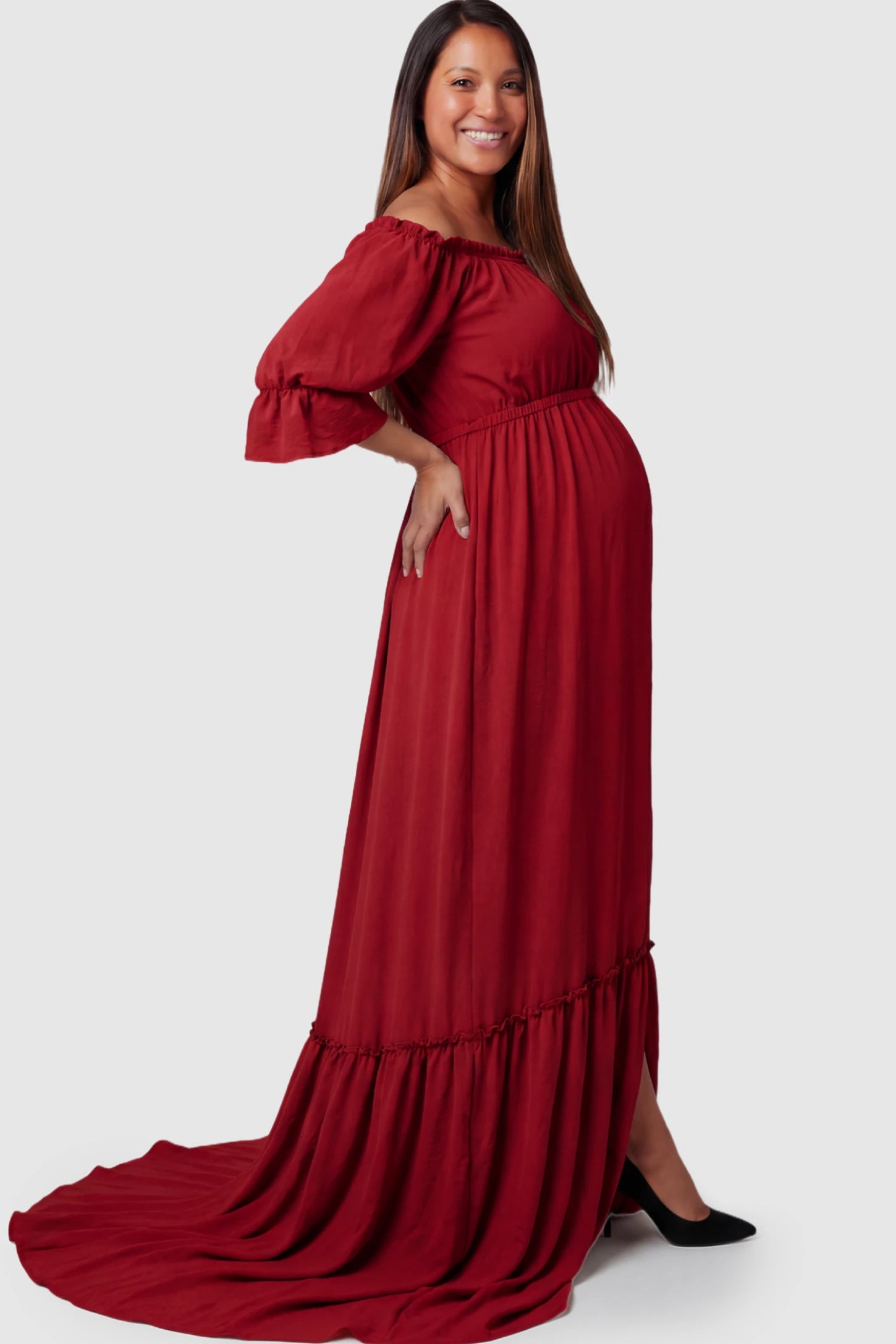 Linen-Blend Button Down Off Shoulder Maternity Maxi Dress Linen-Blend Off-the-Shoulder Maternity Maxi Dress in Wine Red featuring a button-down front on a pregnant model.