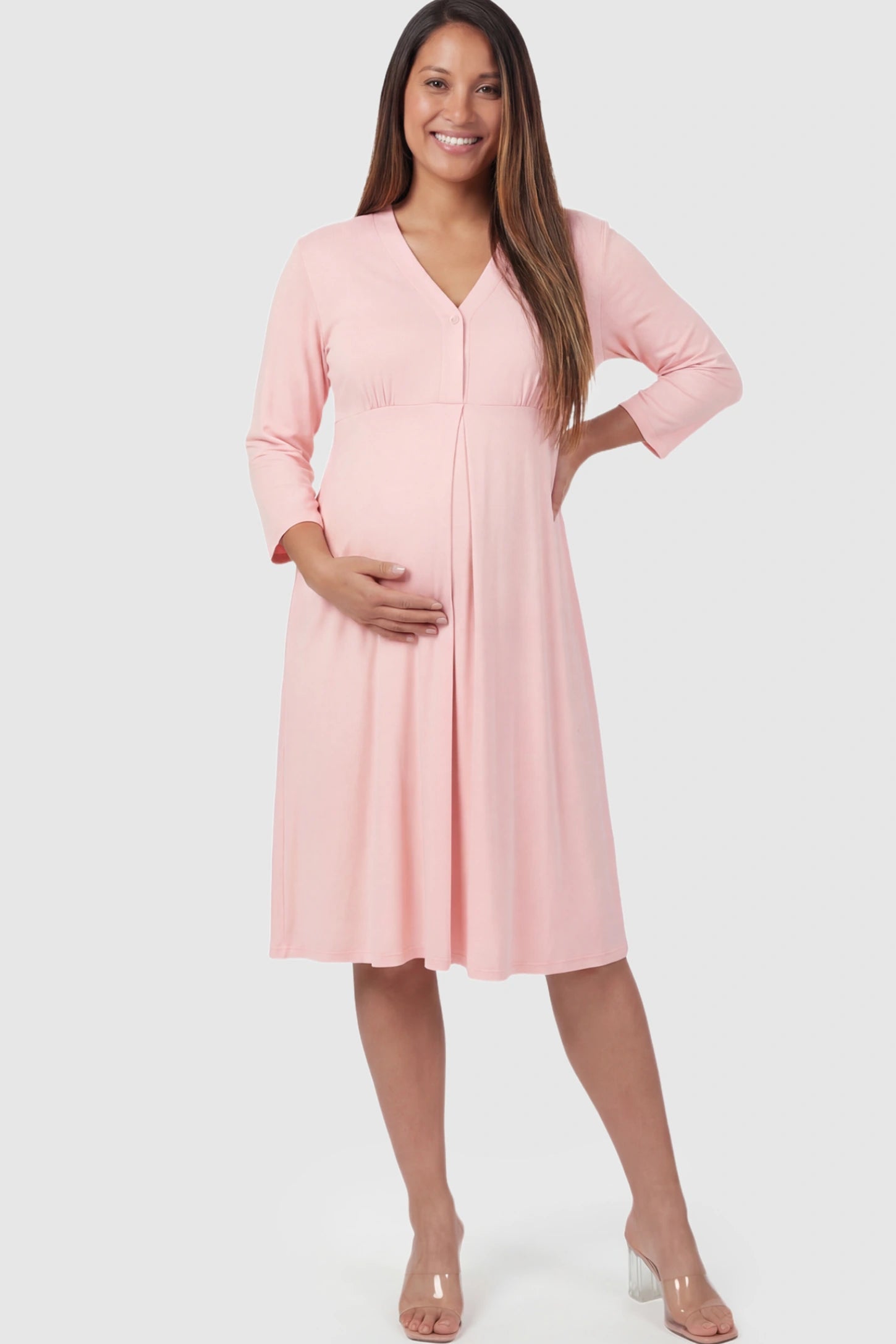 Pure Cotton V-Neck Button Front Maternity Nursing Dress Pure Cotton V-Neck Button Front Maternity Nursing Dress in Pink on a pregnant model.