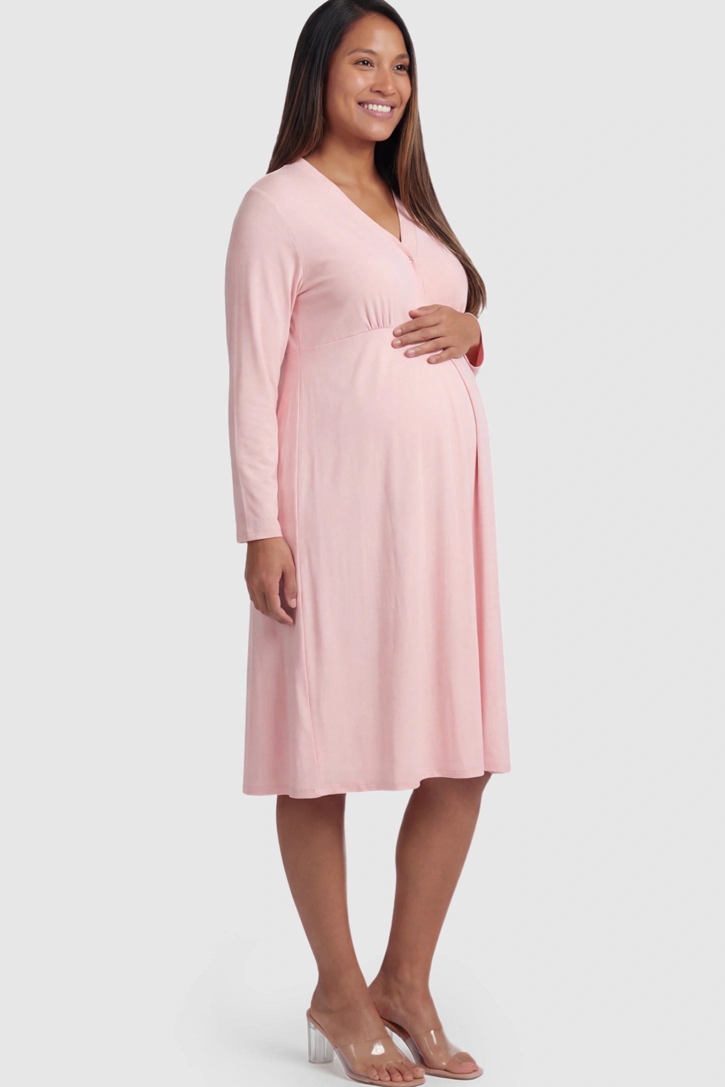 Pure Cotton V-Neck Button Front Maternity Nursing Dress Pure Cotton V-Neck Button Front Maternity Nursing Dress in Pink on a pregnant model.