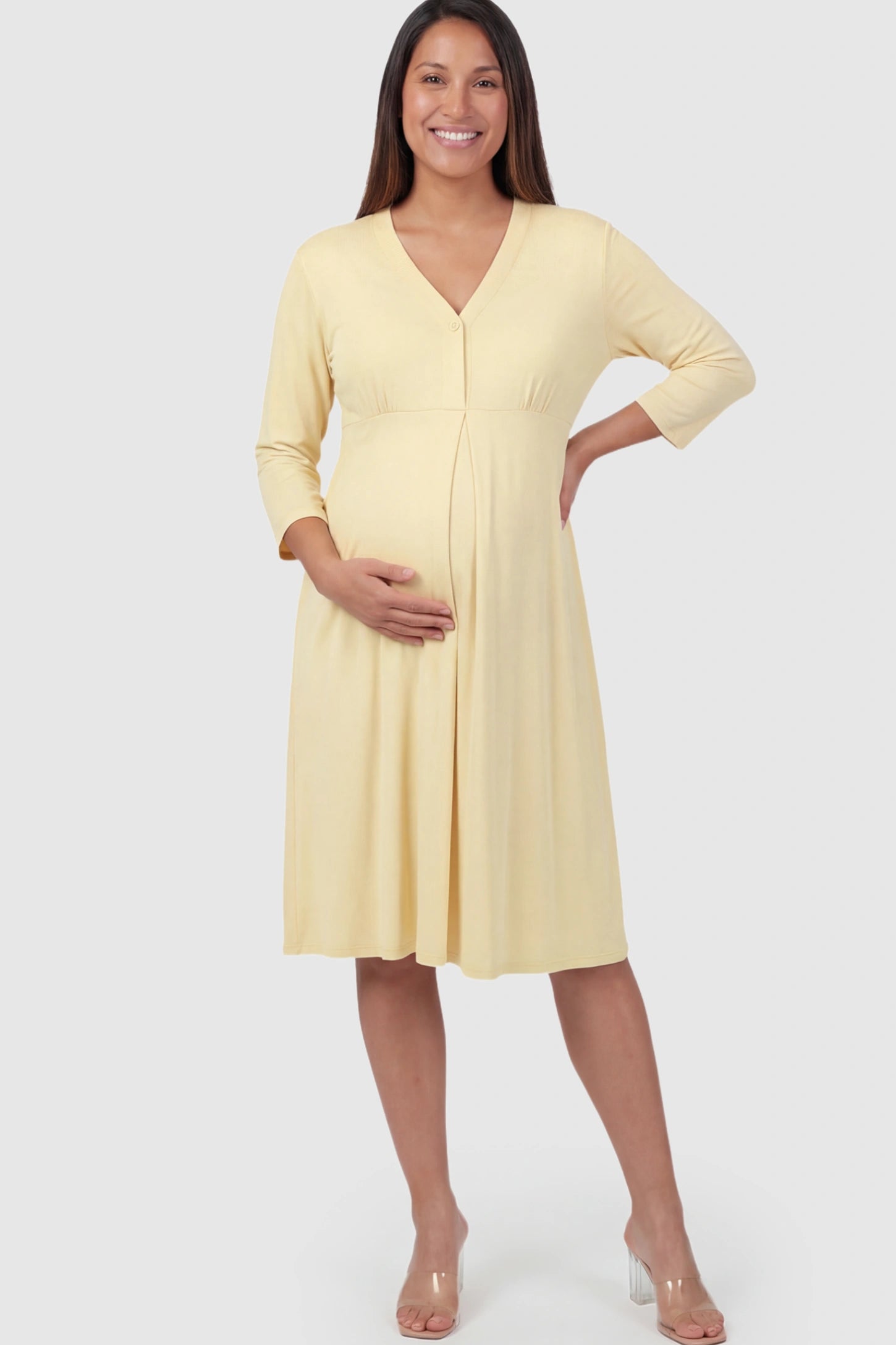 Pure Cotton V-Neck Button Front Maternity Nursing Dress Pure Cotton V-Neck Button Front Maternity Nursing Dress in Yellow on a pregnant model.