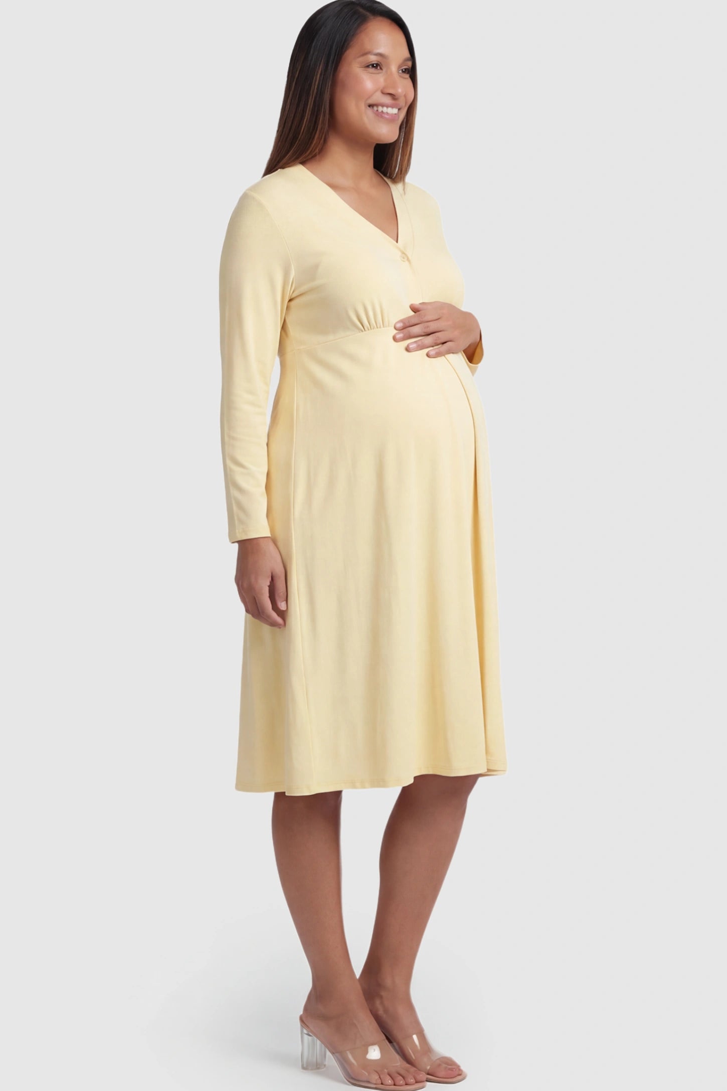 Pure Cotton V-Neck Button Front Maternity Nursing Dress Pure Cotton V-Neck Button Front Maternity Nursing Dress in Yellow on a pregnant model.