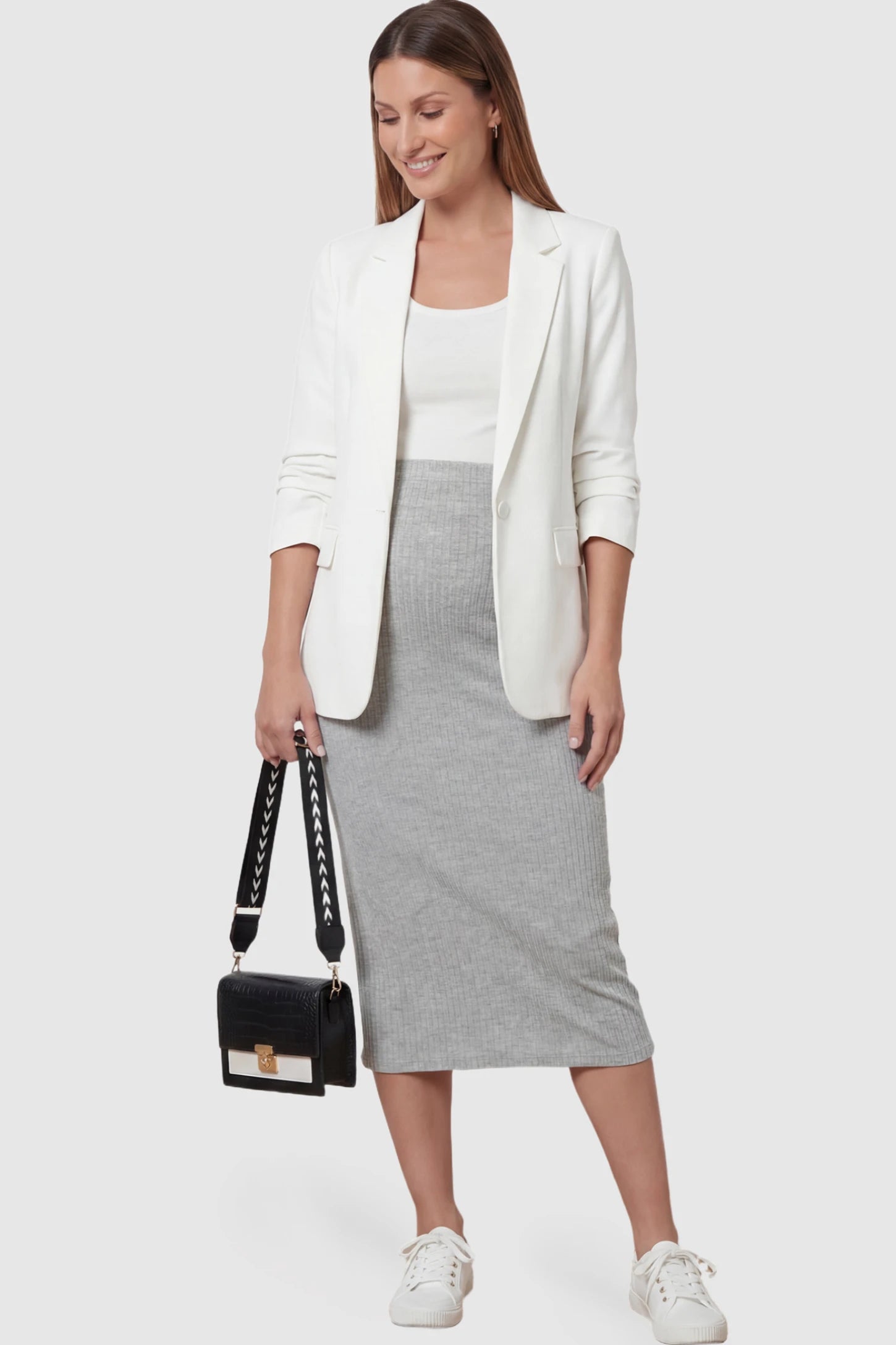 Ribbed Knit High Waist Maternity Skirt in Gray featuring a vertical ribbed texture on a pregnant model showing front.