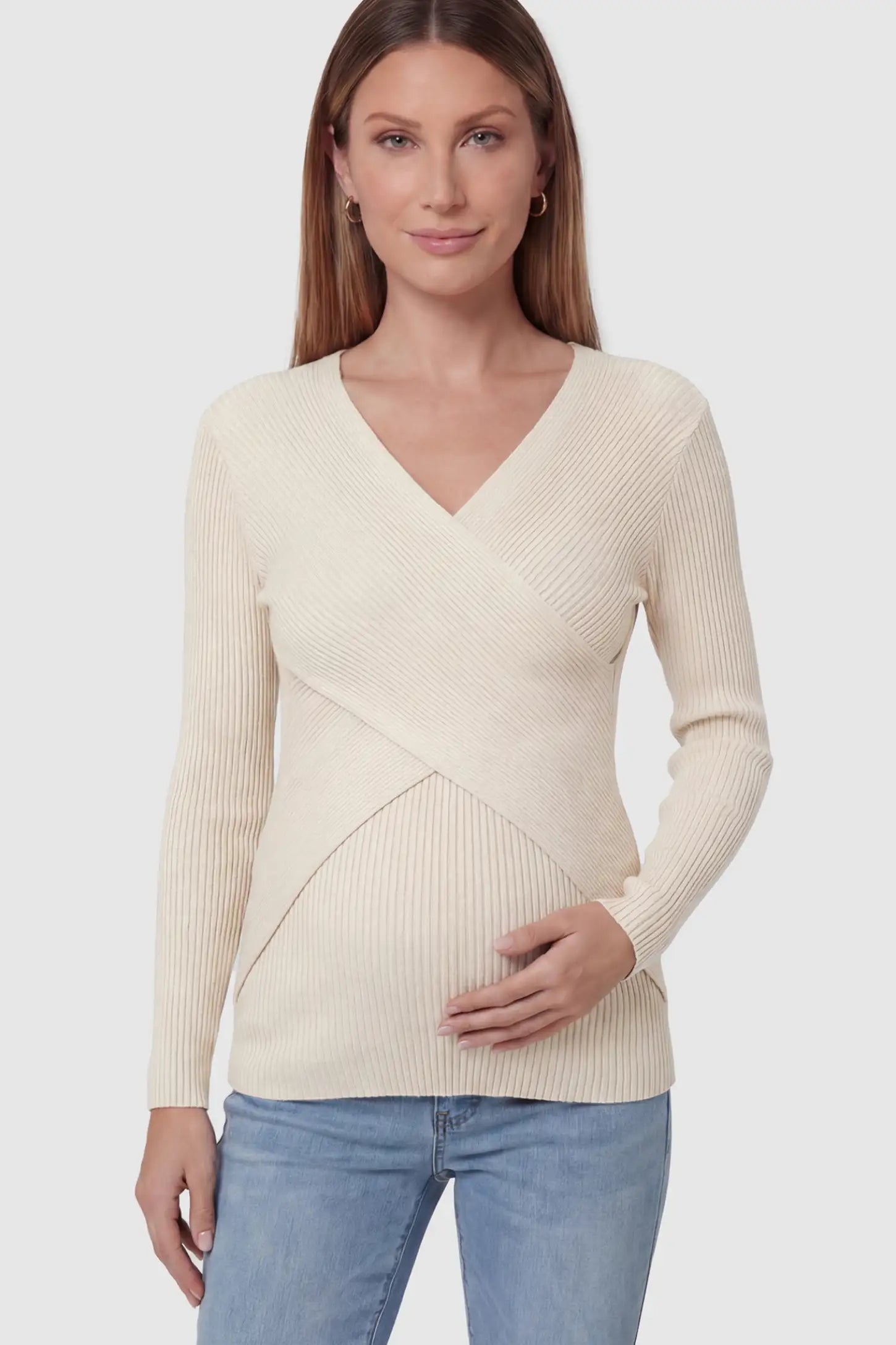Cross-Over Ribbed Knit Maternity & Nursing Top in Apricot featuring a wrap neckline and textured finish on a pregnant model.