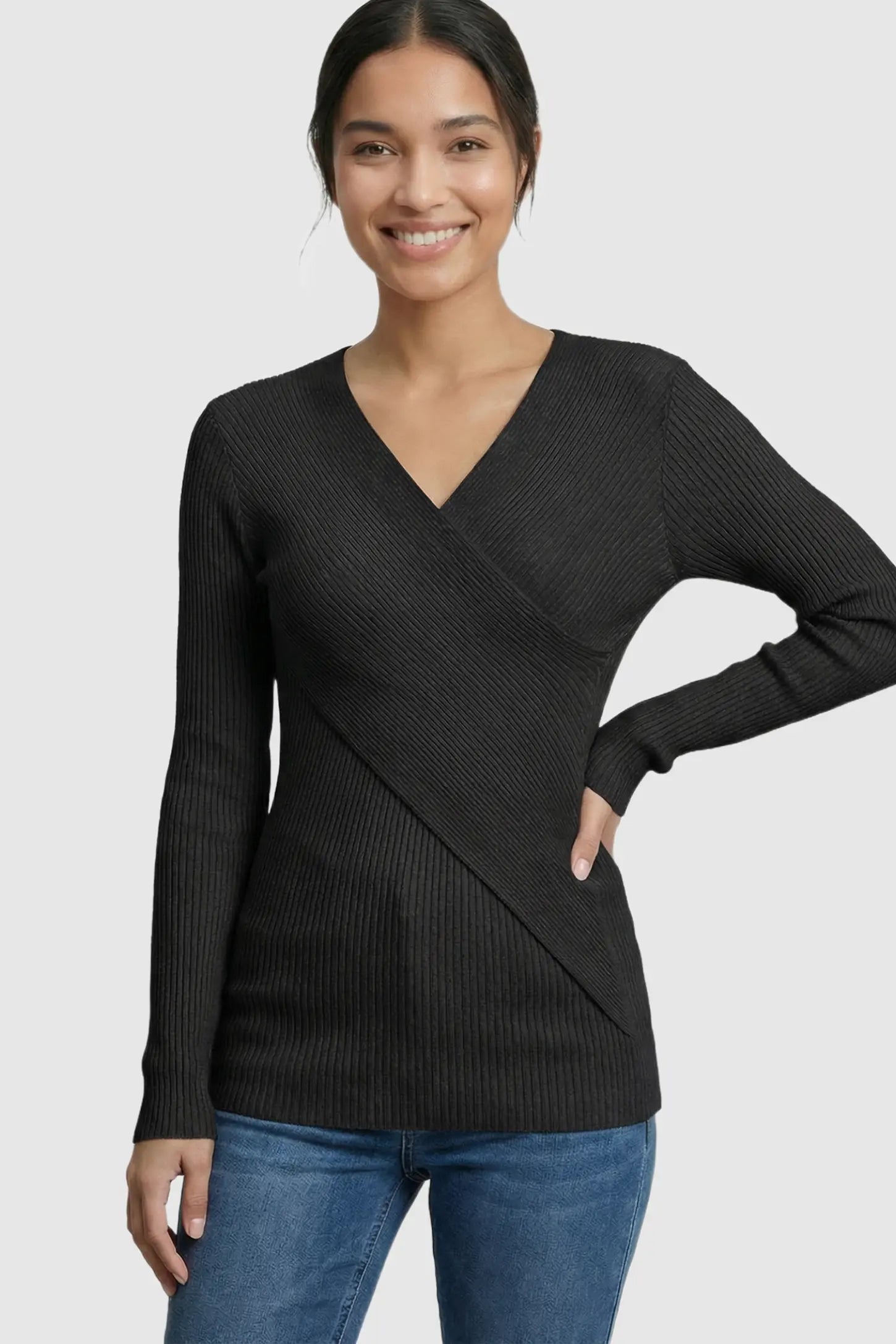 Cross-Over Ribbed Knit Maternity & Nursing Top Cross-Over Ribbed Knit Maternity & Nursing Top in Black featuring a wrap neckline and textured finish on a non pregnant model.