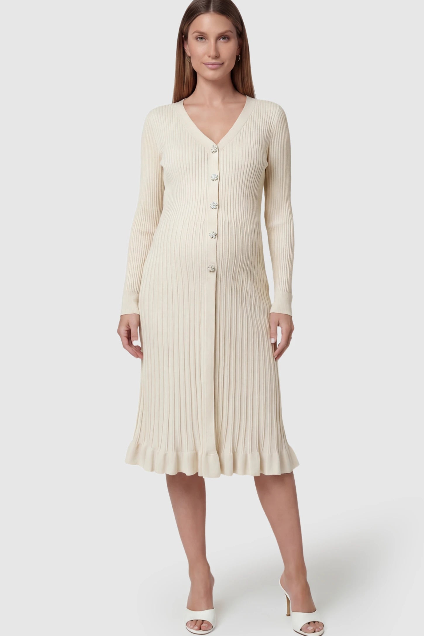Ribbed V-Neck Maternity Midi Sweater Dress Ribbed V-Neck Maternity Midi Sweater Dress in White featuring rhinestone buttons on a pregnant model.