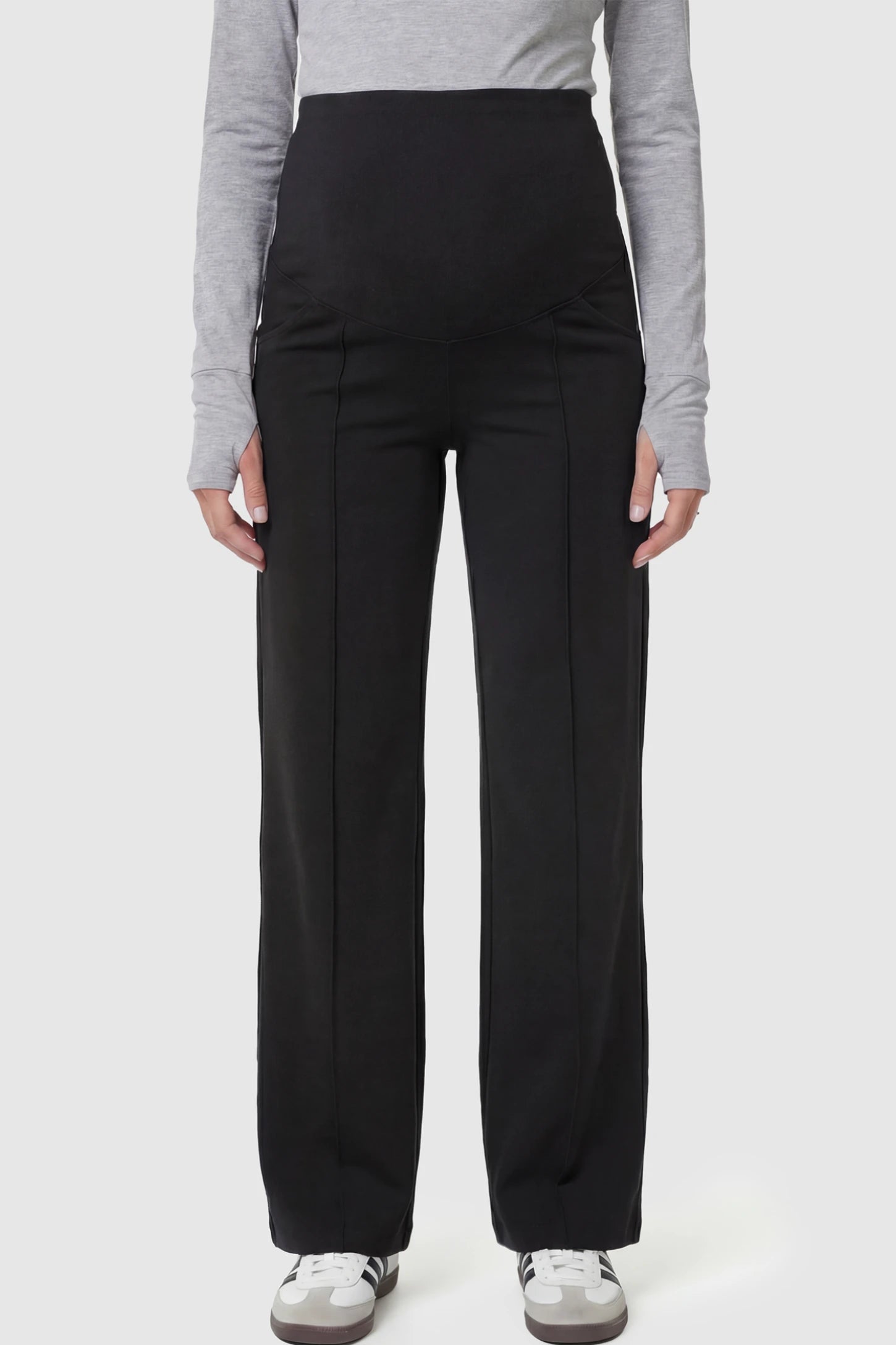 High Stretch Wide Leg Pocketed Maternity Pants High-Stretch Wide Leg Pocketed Maternity Pants in Black featuring a seamless over-the-bump panel and side pocket on a pregnant model.