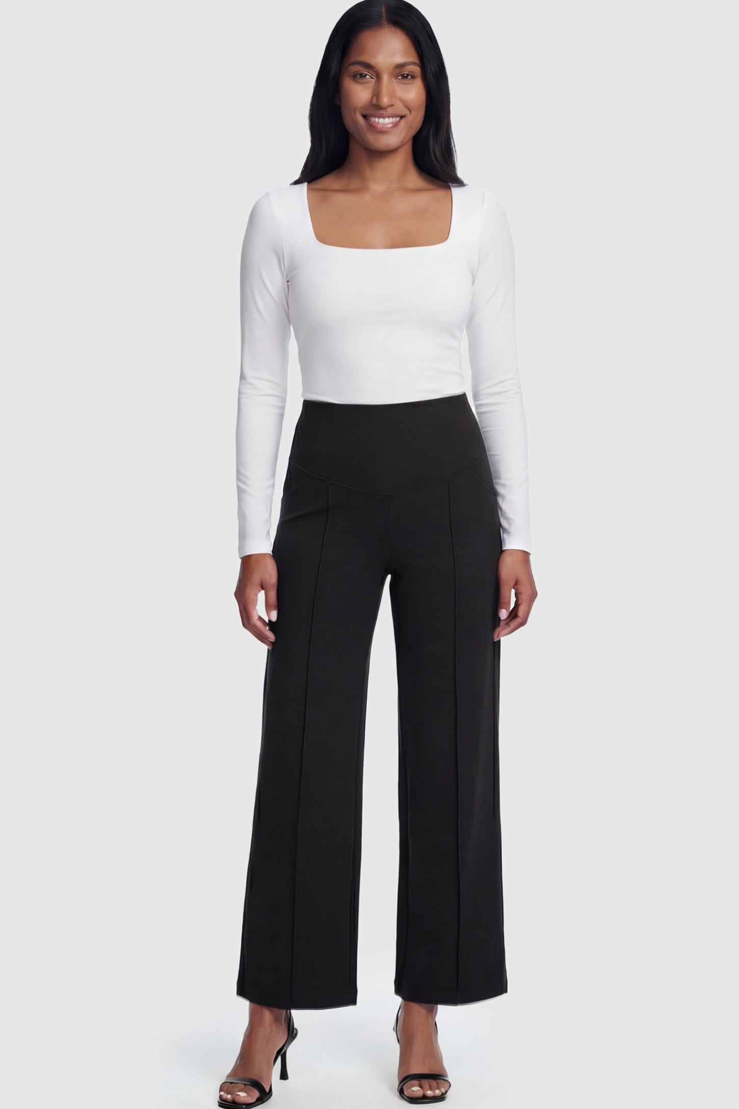 High Stretch Wide Leg Pocketed Maternity Pants High-Stretch Wide Leg Pocketed Maternity Pants in Black featuring a seamless over-the-bump panel and side pocket on a postpartum model.