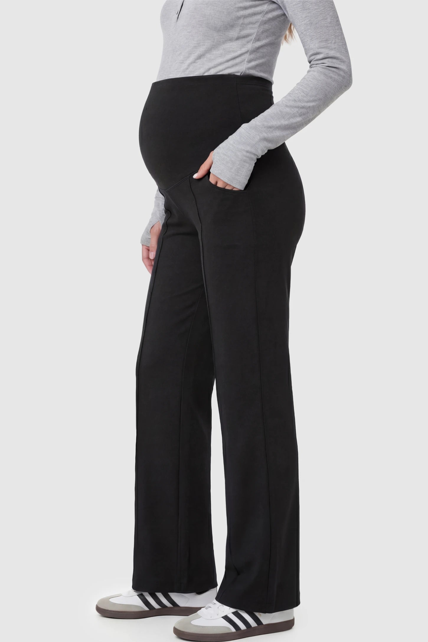 High Stretch Wide Leg Pocketed Maternity Pants High-Stretch Wide Leg Pocketed Maternity Pants in Black featuring a seamless over-the-bump panel and side pocket on a pregnant model.