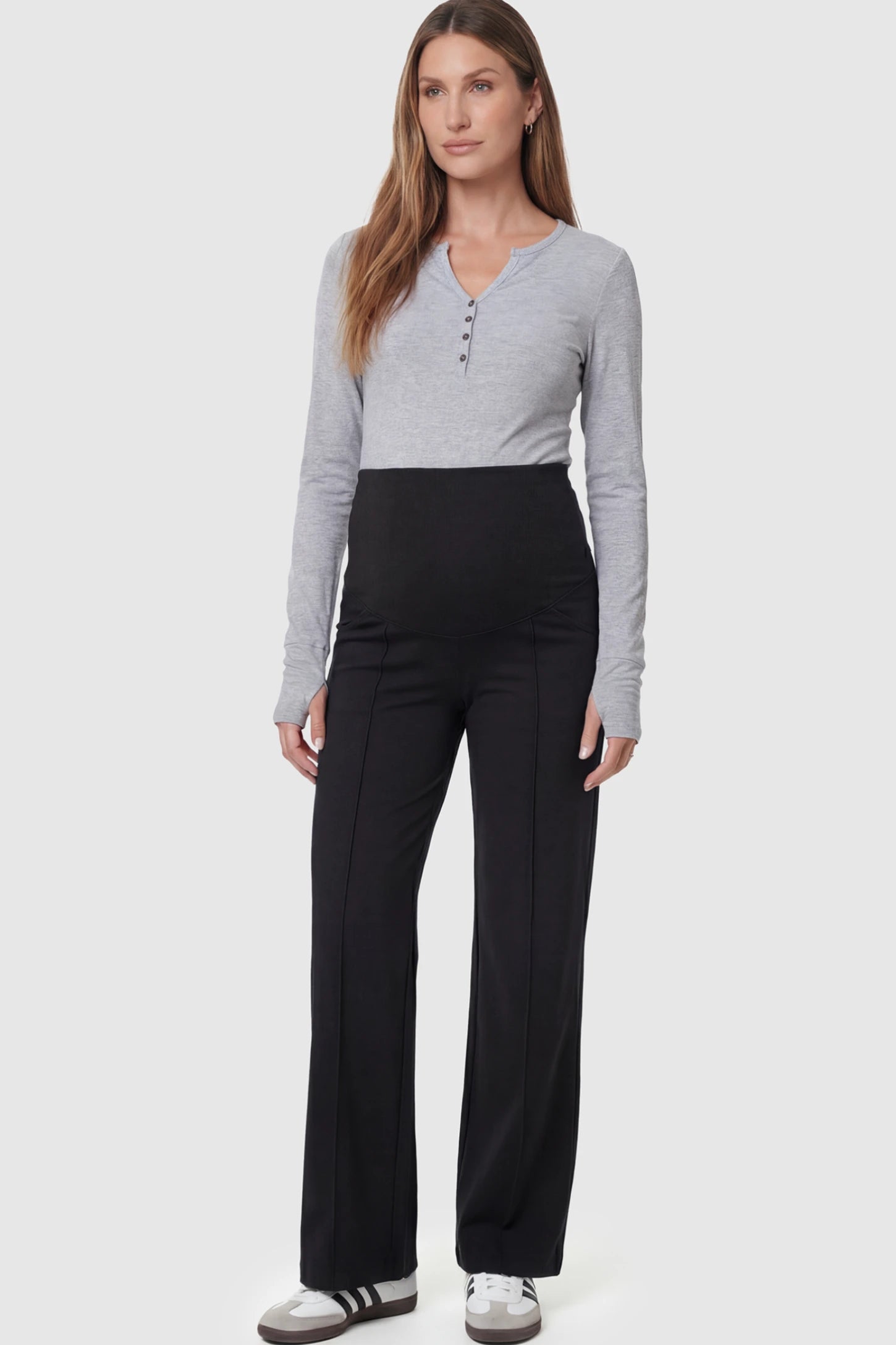 High Stretch Wide Leg Pocketed Maternity Pants High-Stretch Wide Leg Pocketed Maternity Pants in Black featuring a seamless over-the-bump panel and side pocket on a pregnant model.