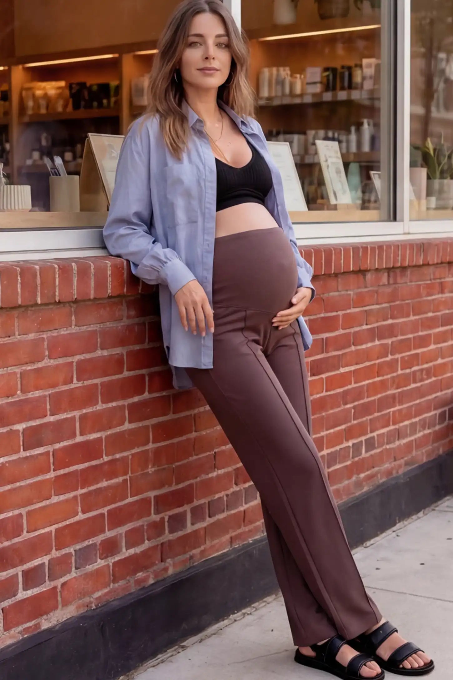 High Stretch Wide Leg Pocketed Maternity Pants High-Stretch Wide Leg Pocketed Maternity Pants in Brown featuring a seamless over-the-bump panel and side pocket on a pregnant model.