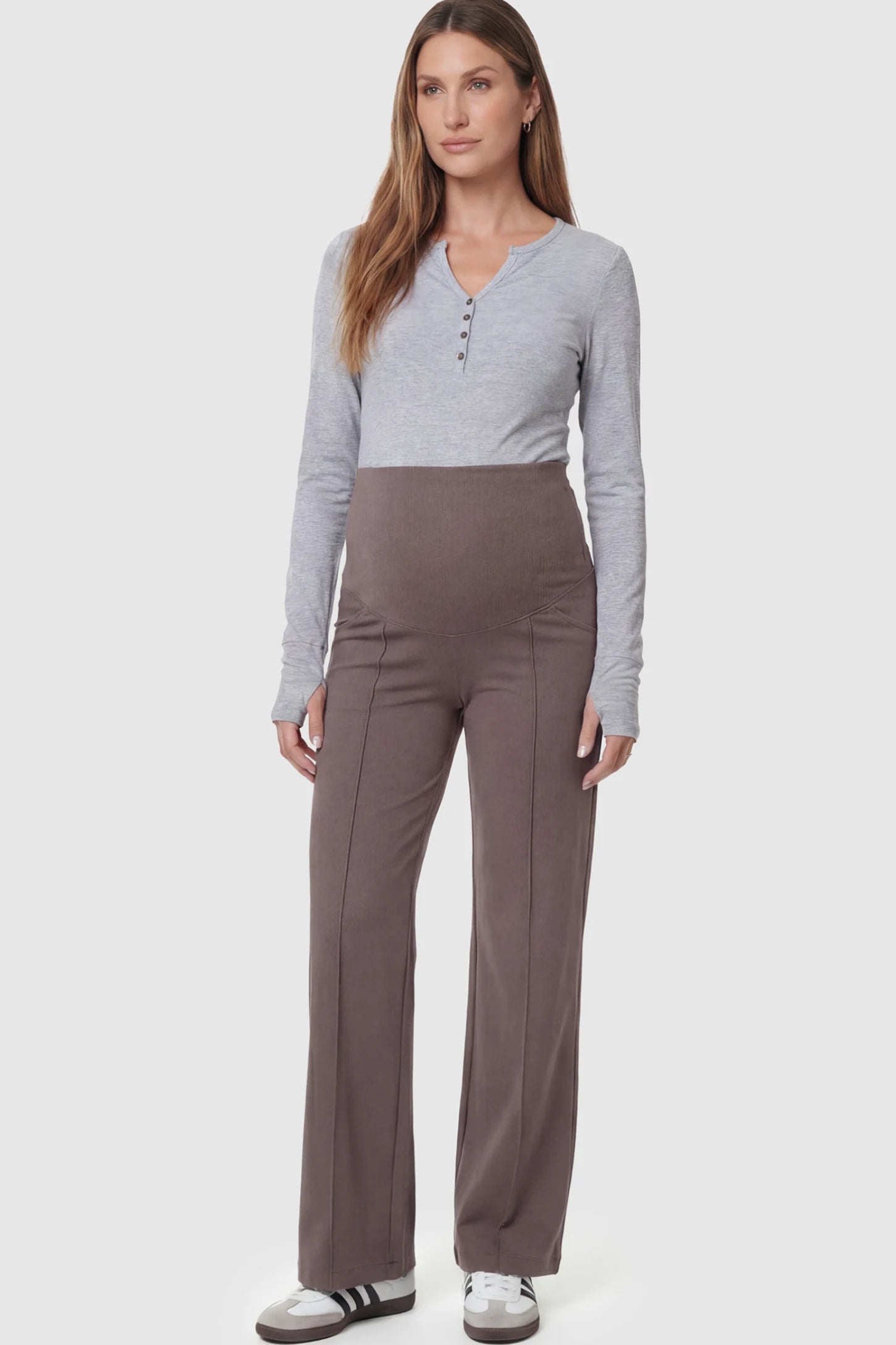 High Stretch Wide Leg Pocketed Maternity Pants High-Stretch Wide Leg Pocketed Maternity Pants in Brown featuring a seamless over-the-bump panel and side pocket on a pregnant model.