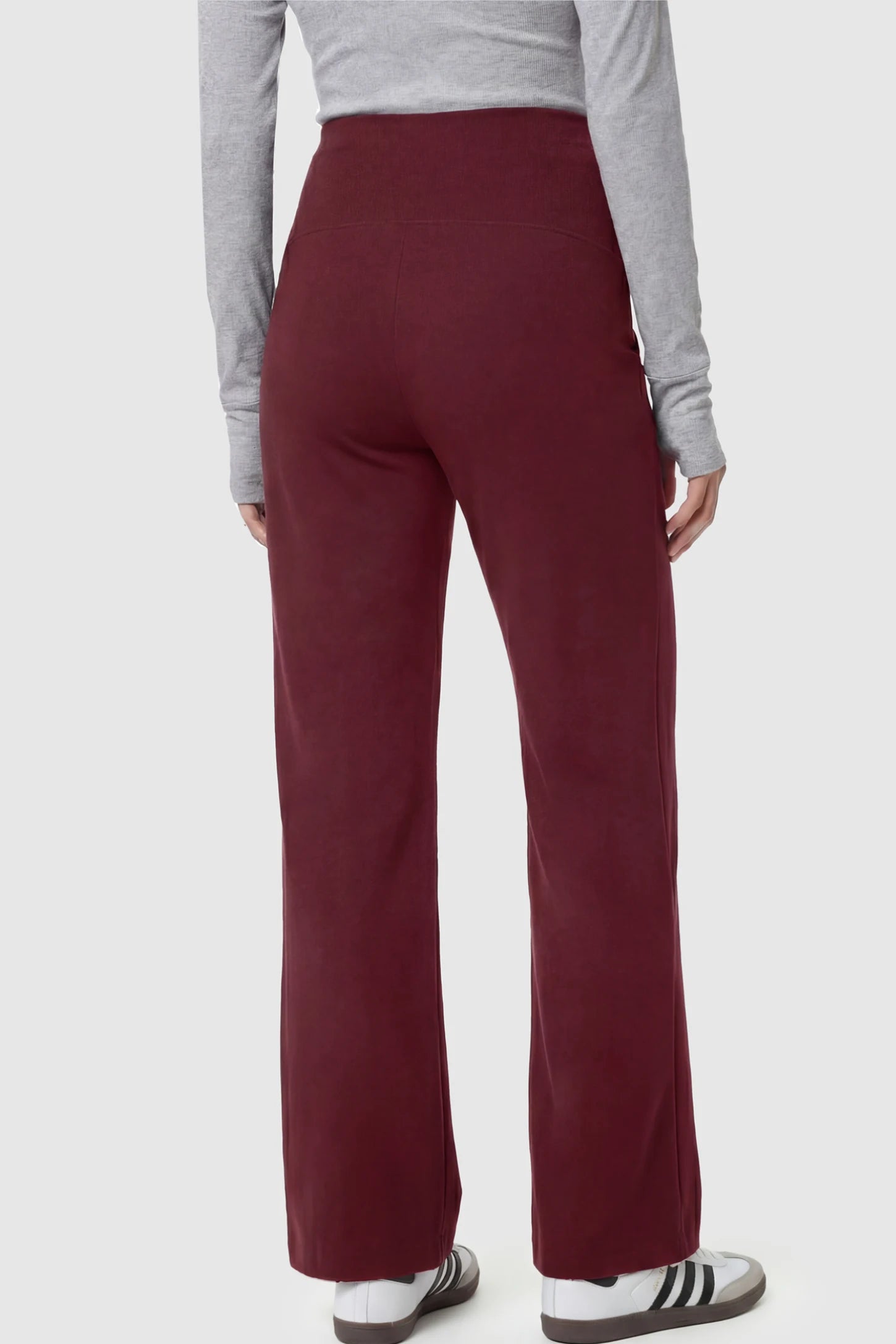 High Stretch Wide Leg Pocketed Maternity Pants High-Stretch Wide Leg Pocketed Maternity Pants in Burgundy featuring a seamless over-the-bump panel and side pocket on a pregnant model.