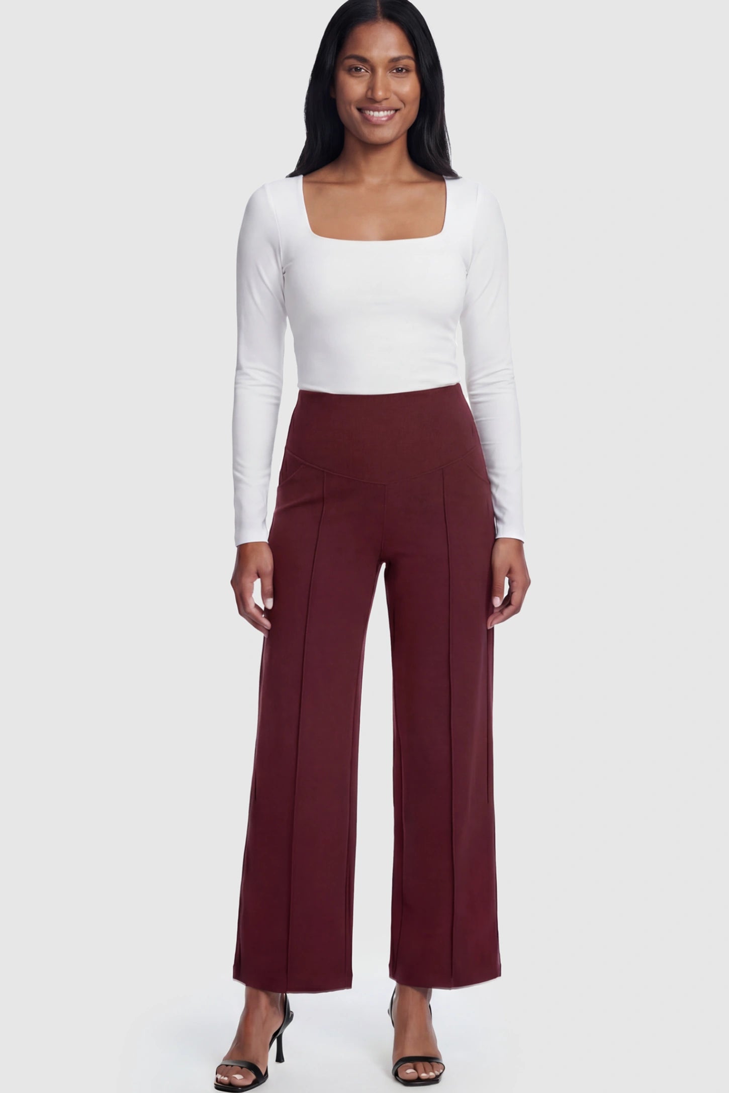 High Stretch Wide Leg Pocketed Maternity Pants High-Stretch Wide Leg Pocketed Maternity Pants in Burgundy featuring a seamless over-the-bump panel and side pocket on a postpartum model.