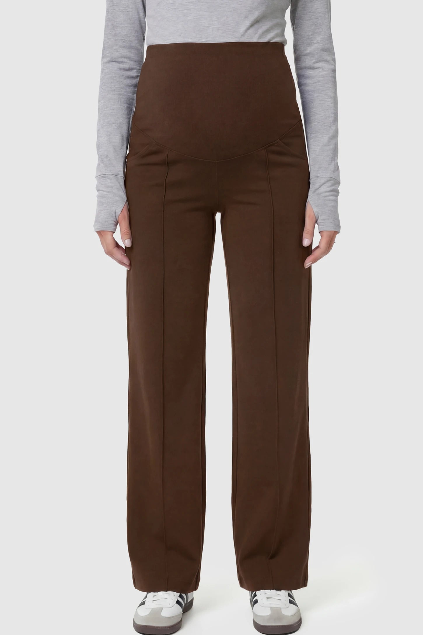 High Stretch Wide Leg Pocketed Maternity Pants High-Stretch Wide Leg Pocketed Maternity Pants in Coffee featuring a seamless over-the-bump panel and side pocket on a pregnant model.