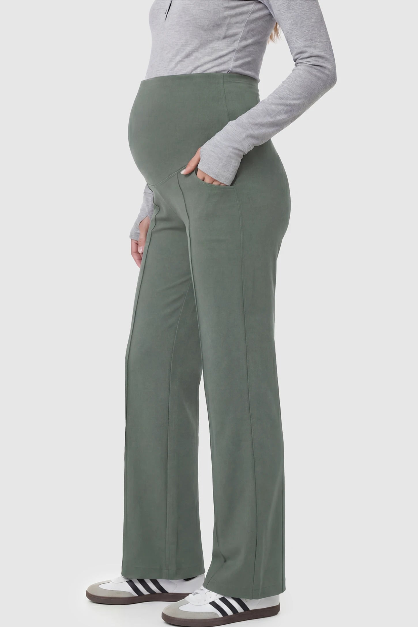 High Stretch Wide Leg Pocketed Maternity Pants High-Stretch Wide Leg Pocketed Maternity Pants in Green featuring a seamless over-the-bump panel and side pocket on a pregnant model.