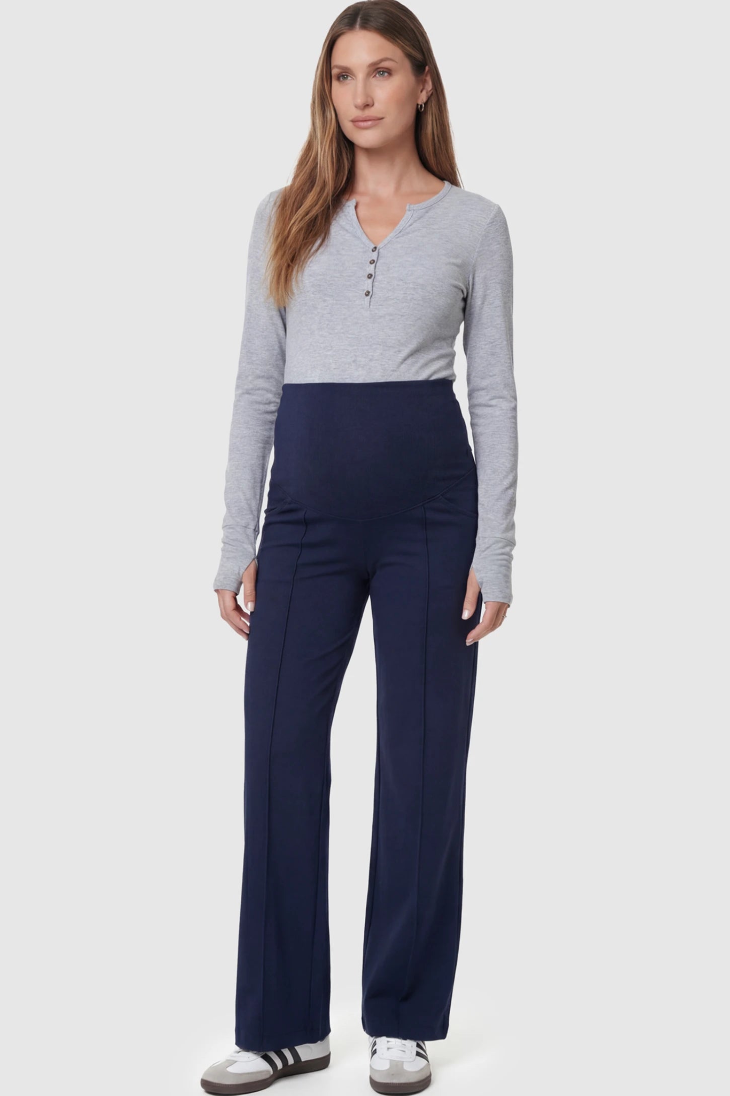 High Stretch Wide Leg Pocketed Maternity Pants High-Stretch Wide Leg Pocketed Maternity Pants in Navvy Blue featuring a seamless over-the-bump panel and side pocket on a pregnant model.