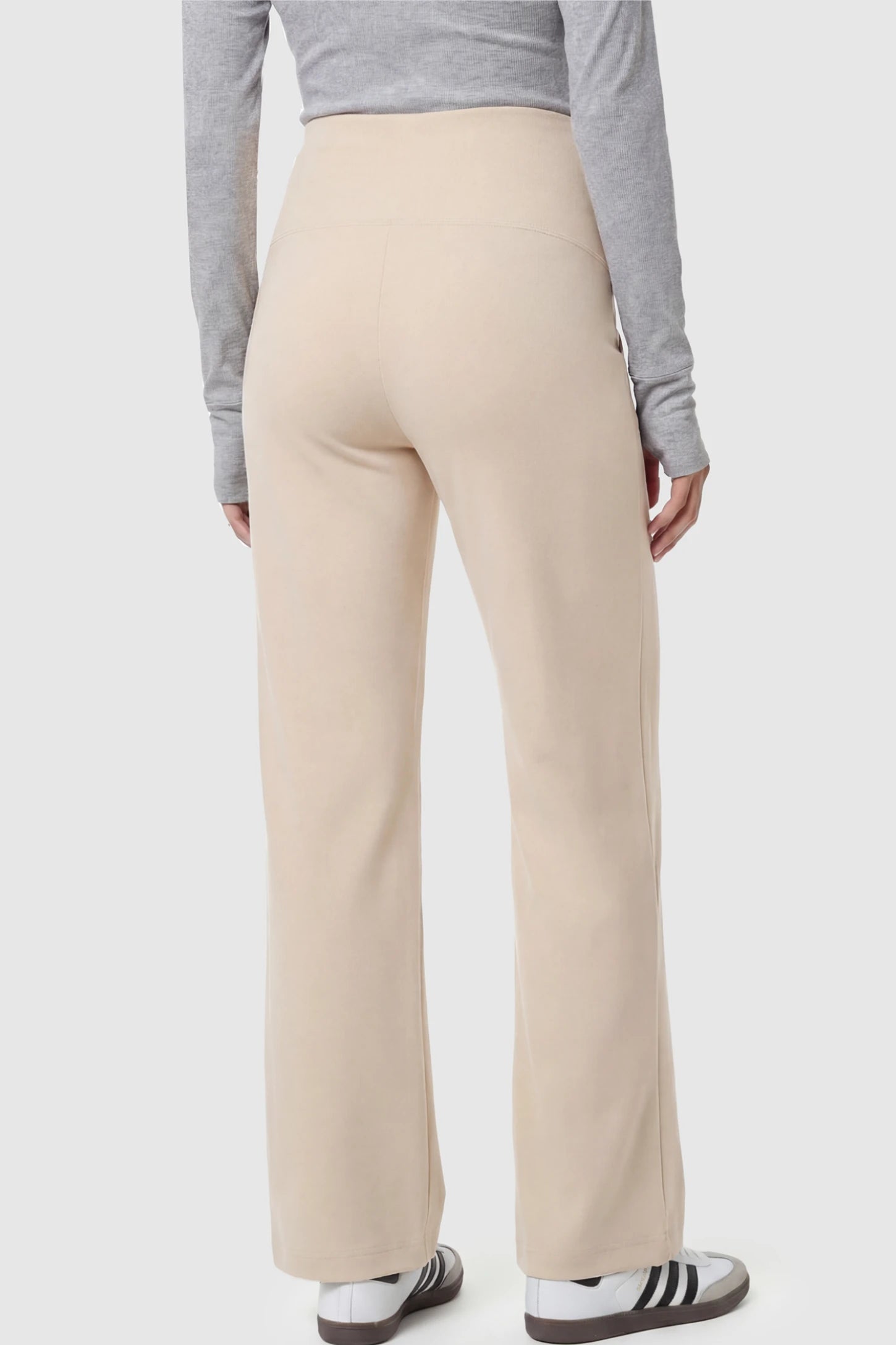 High Stretch Wide Leg Pocketed Maternity Pants High-Stretch Wide Leg Pocketed Maternity Pants in Off White on a pregnant model.