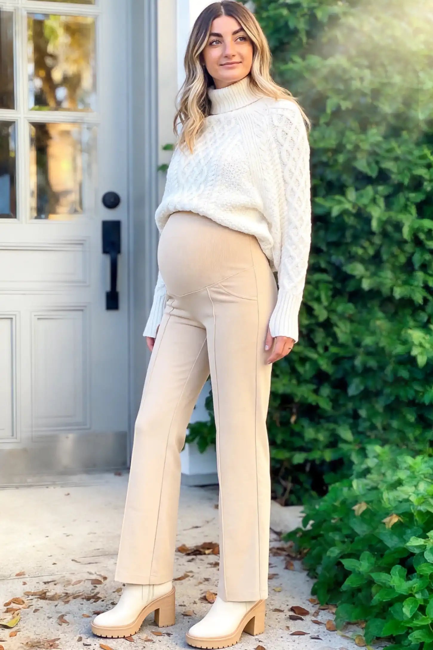 High Stretch Wide Leg Pocketed Maternity Pants High-Stretch Wide Leg Pocketed Maternity Pants in Off White featuring a seamless over-the-bump panel and side pockets on a pregnant woman.