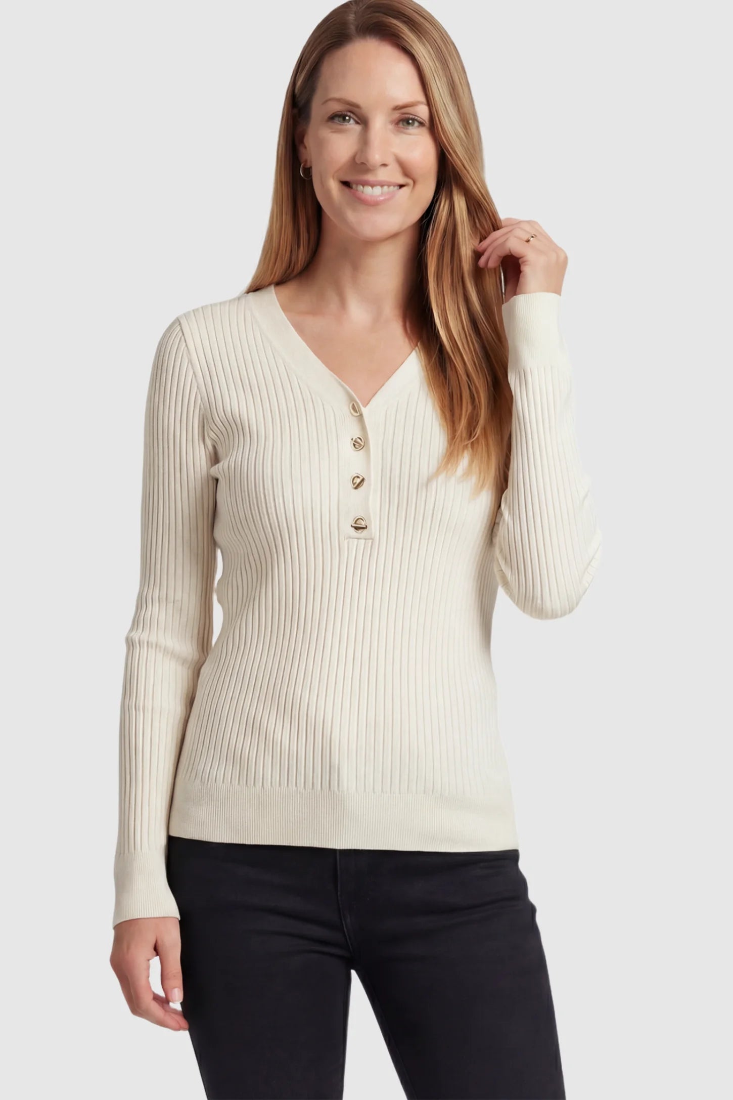 Ribbed Long Sleeve Maternity Henley Top Ribbed Maternity Henley Top in Apricot featuring a functional button placket and vertical rib knit on a postpartum model.