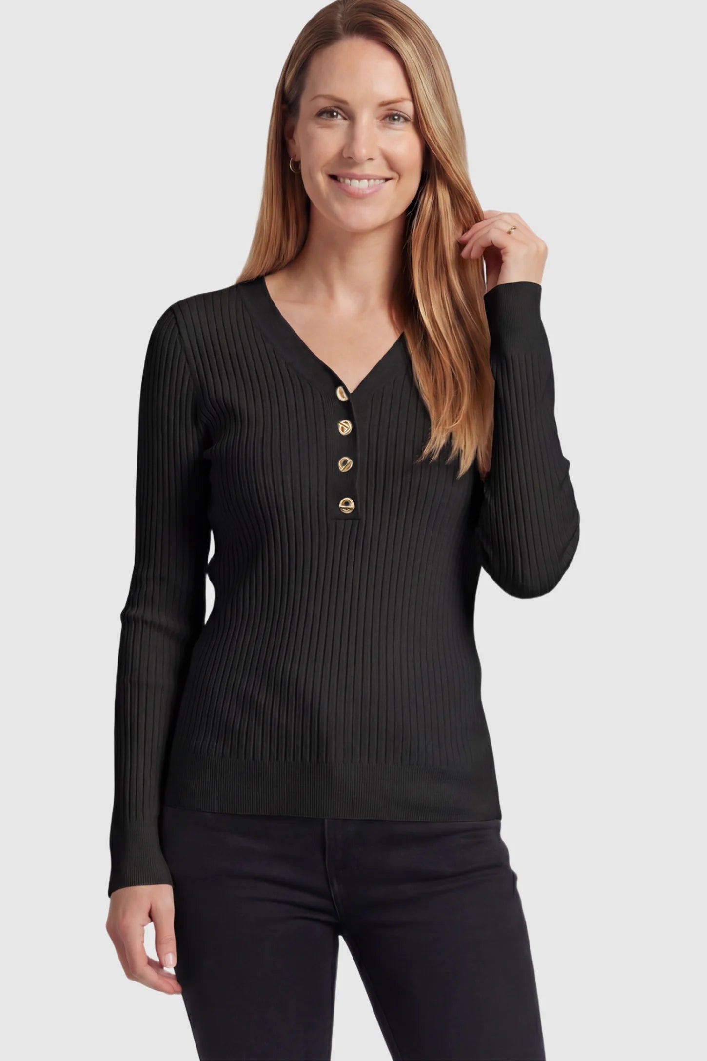 Ribbed Long Sleeve Maternity Henley Top Ribbed Maternity Henley Top in Black featuring a functional button placket and vertical rib knit on a postpartum model.