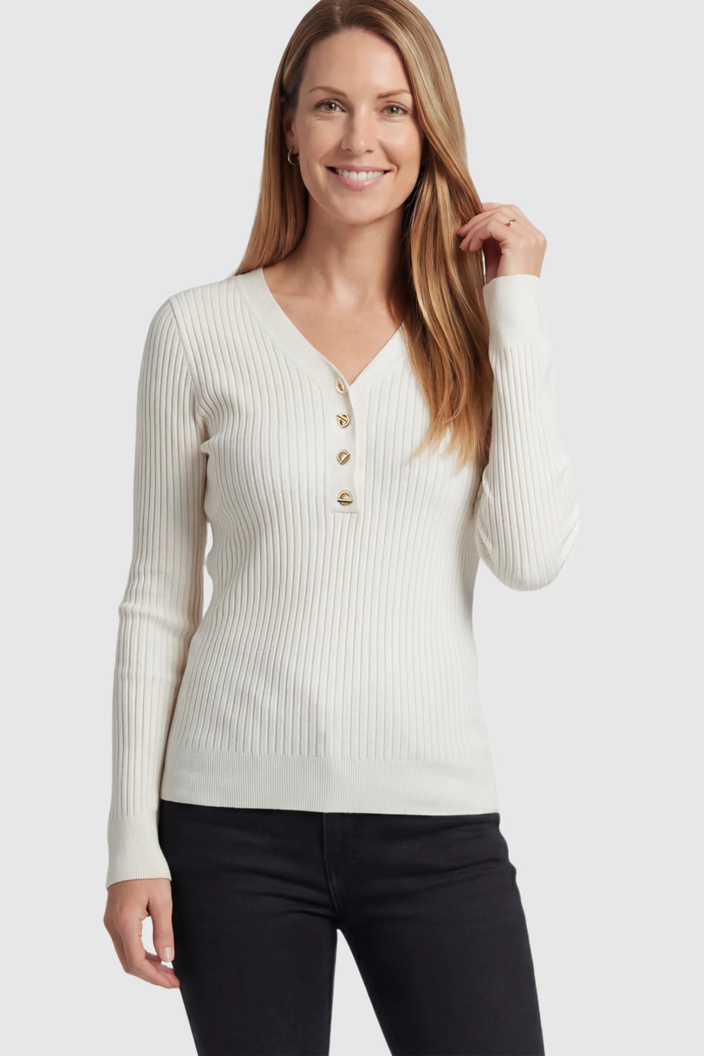 Ribbed Long Sleeve Maternity Henley Top Ribbed Maternity Henley Top in Off White featuring a functional button placket and vertical rib knit on a postpartum model.