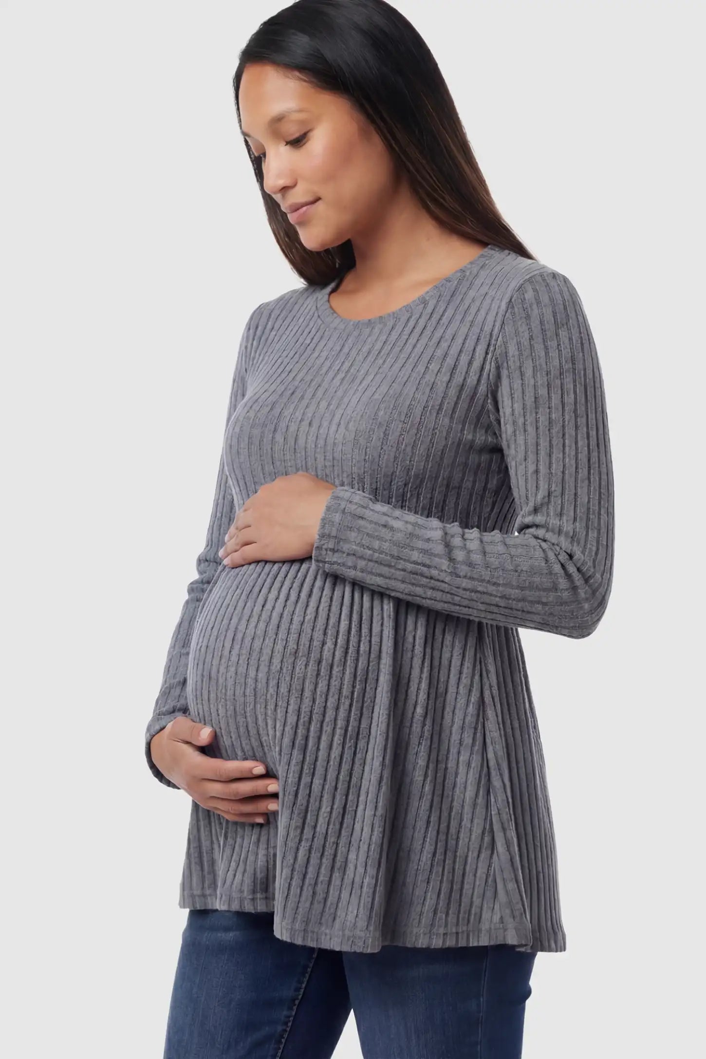 Ribbed Knit Long Sleeve Maternity Top Ribbed Knit Long Sleeve Maternity Top in Dark Gray featuring an empire waist and high-stretch fabric on a pregnant model.