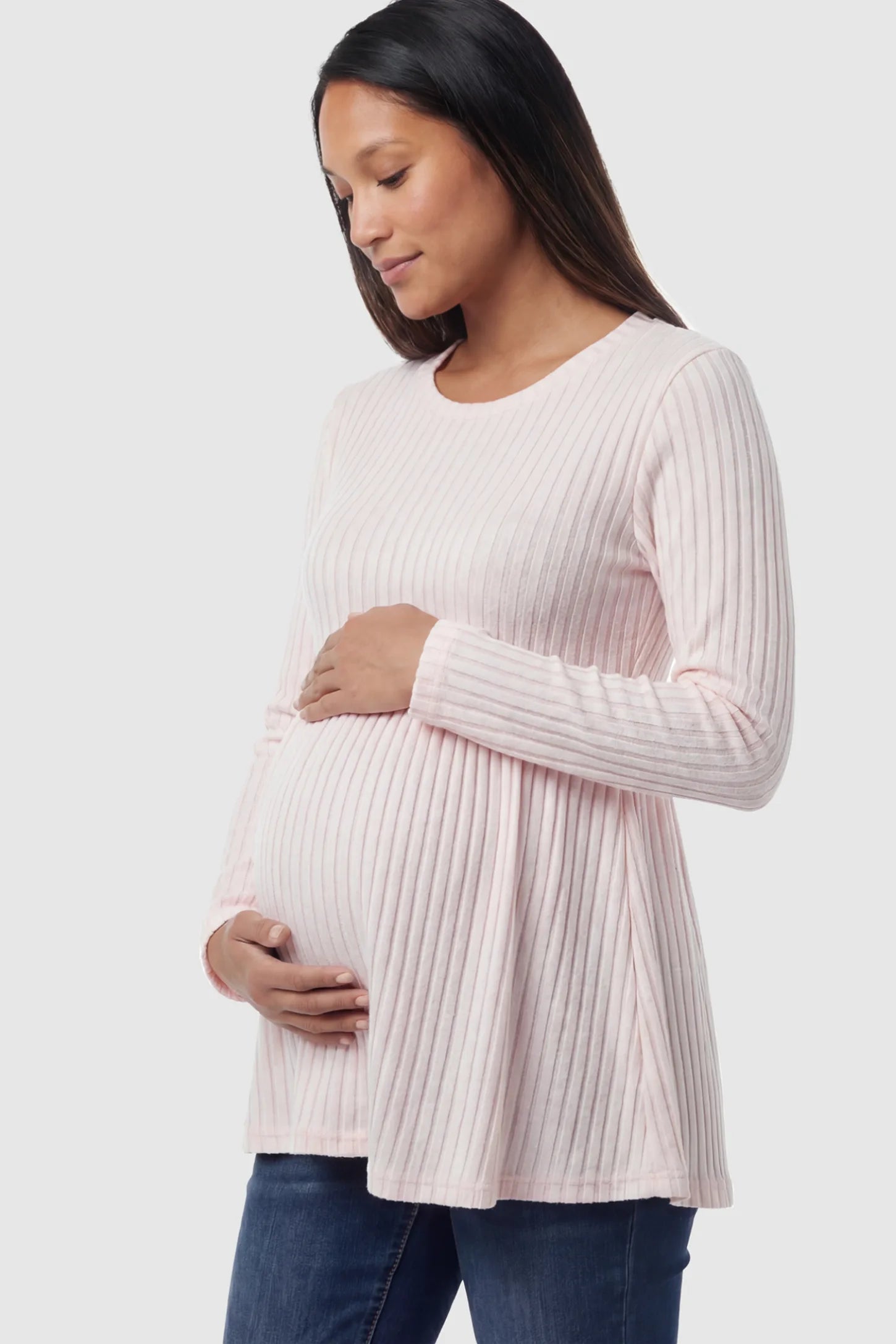 Ribbed Knit Long Sleeve Maternity Top Ribbed Knit Long Sleeve Maternity Top in Pink featuring an empire waist and high-stretch fabric on a pregnant model.