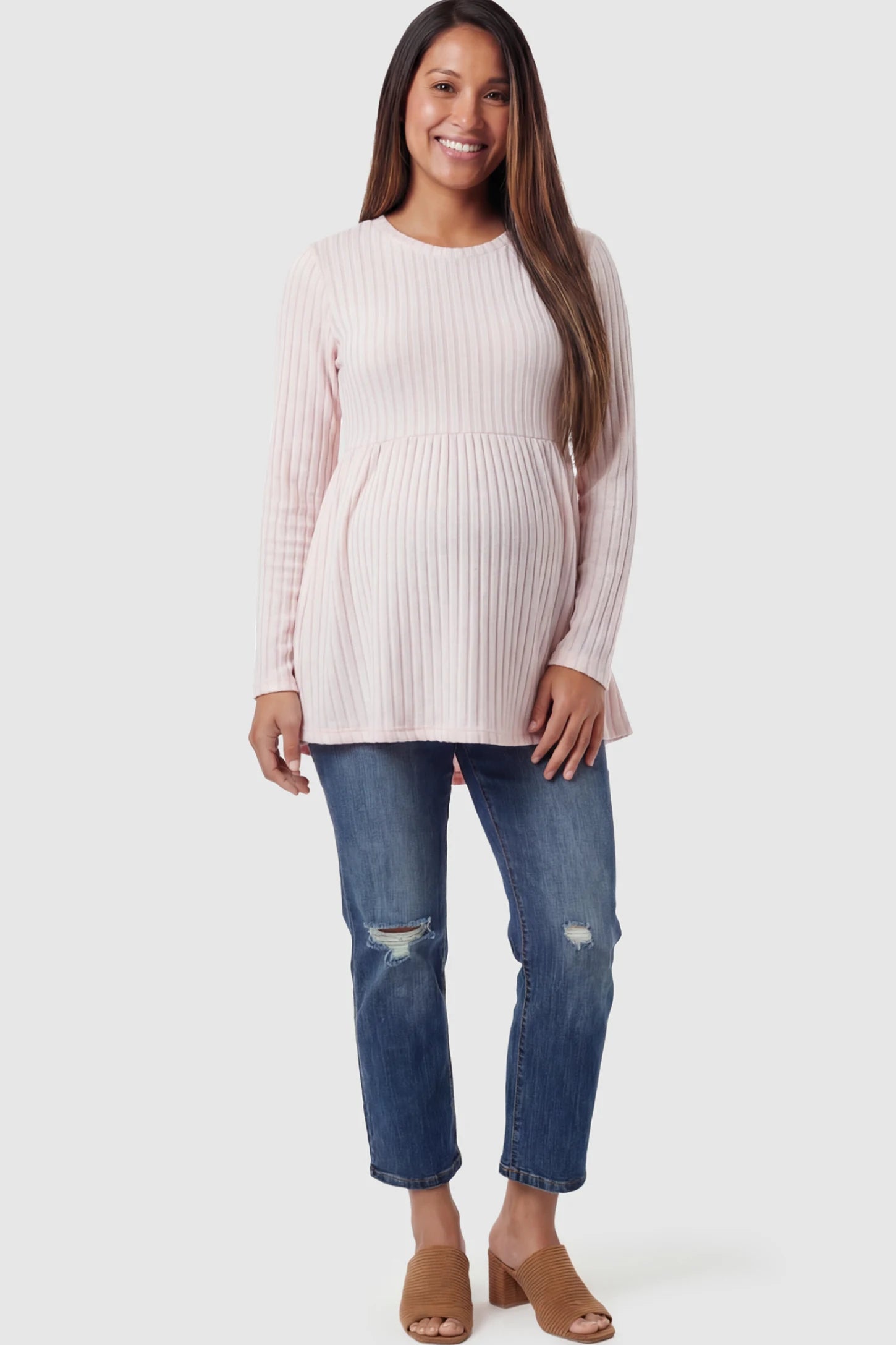 Ribbed Knit Long Sleeve Maternity Top Ribbed Knit Long Sleeve Maternity Top in Pink featuring an empire waist and high-stretch fabric on a pregnant model.