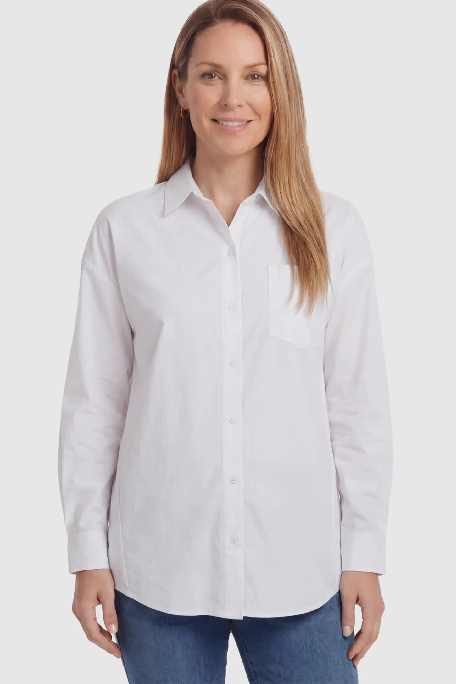 Button Down Collared Maternity Shirt Button Down Collared Maternity Shirt in White featuring long sleeves and a crisp cotton finish on a non pregnant model.