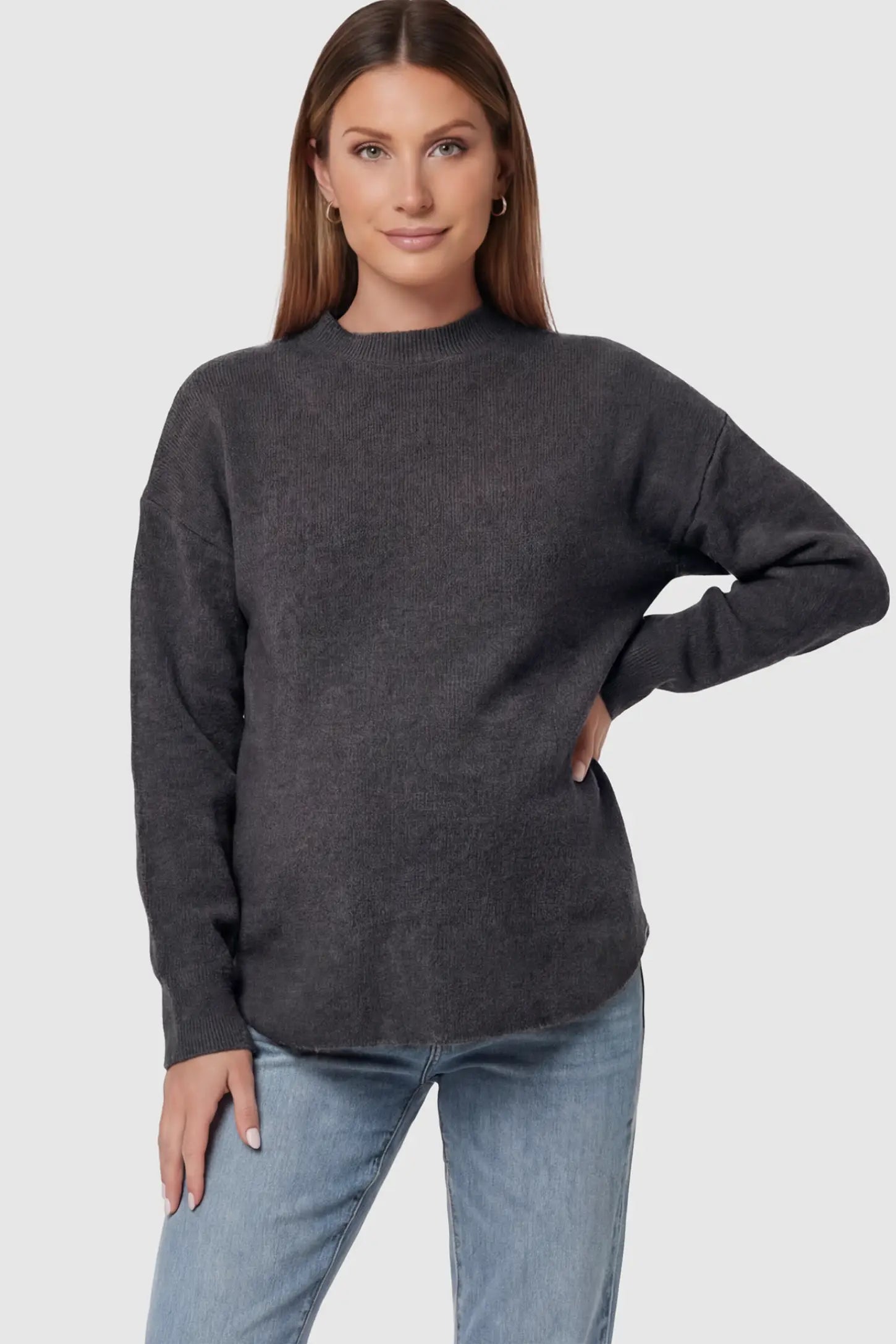Mock Neck Long Sleeve Maternity Sweater Mock Neck Long Sleeve Maternity Sweater in Black thickened woolen fabric on a pregnant model.
