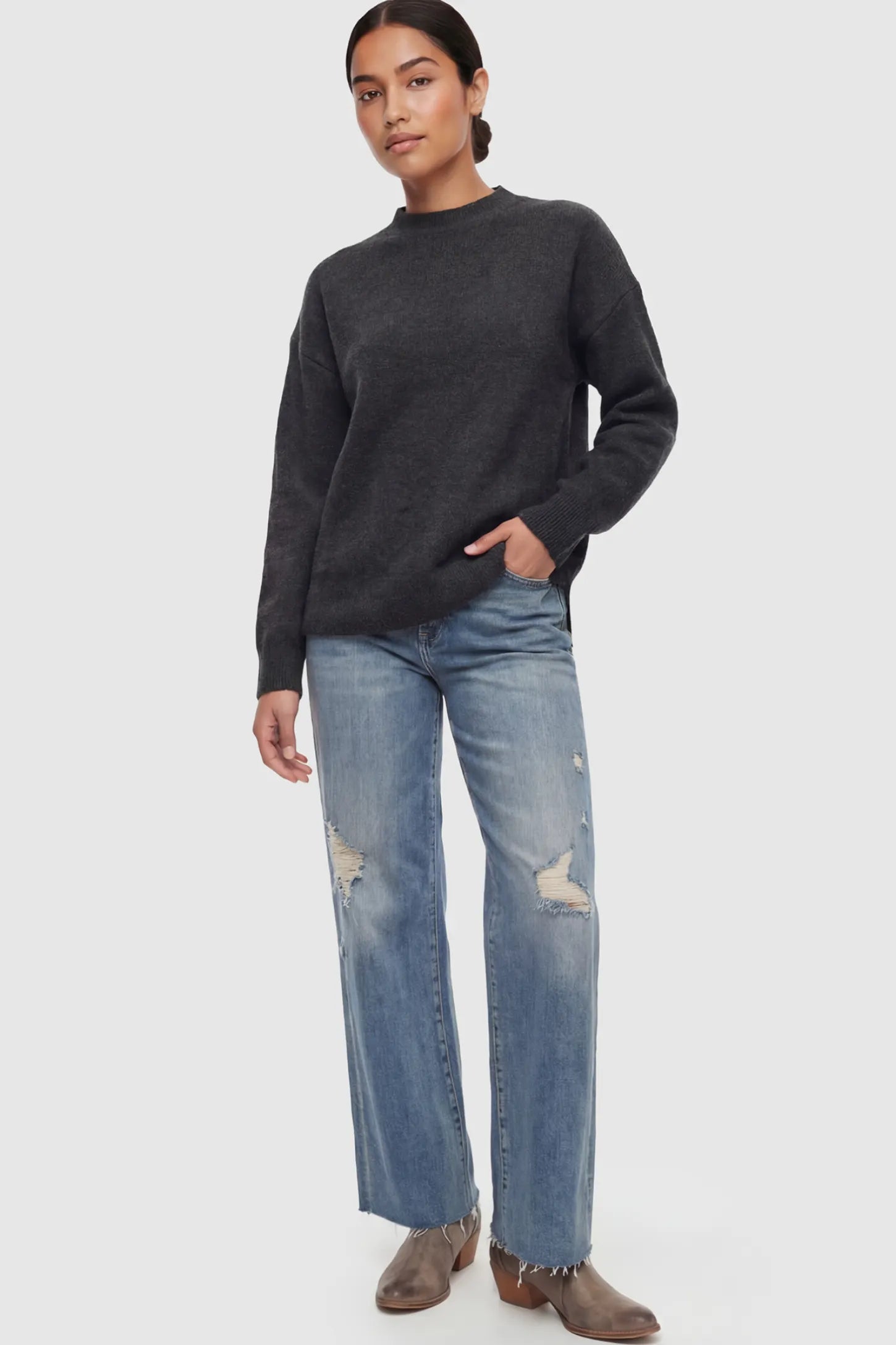 Mock Neck Long Sleeve Maternity Sweater Mock Neck Long Sleeve Maternity Sweater in Black thickened woolen fabric on a postpartum model.