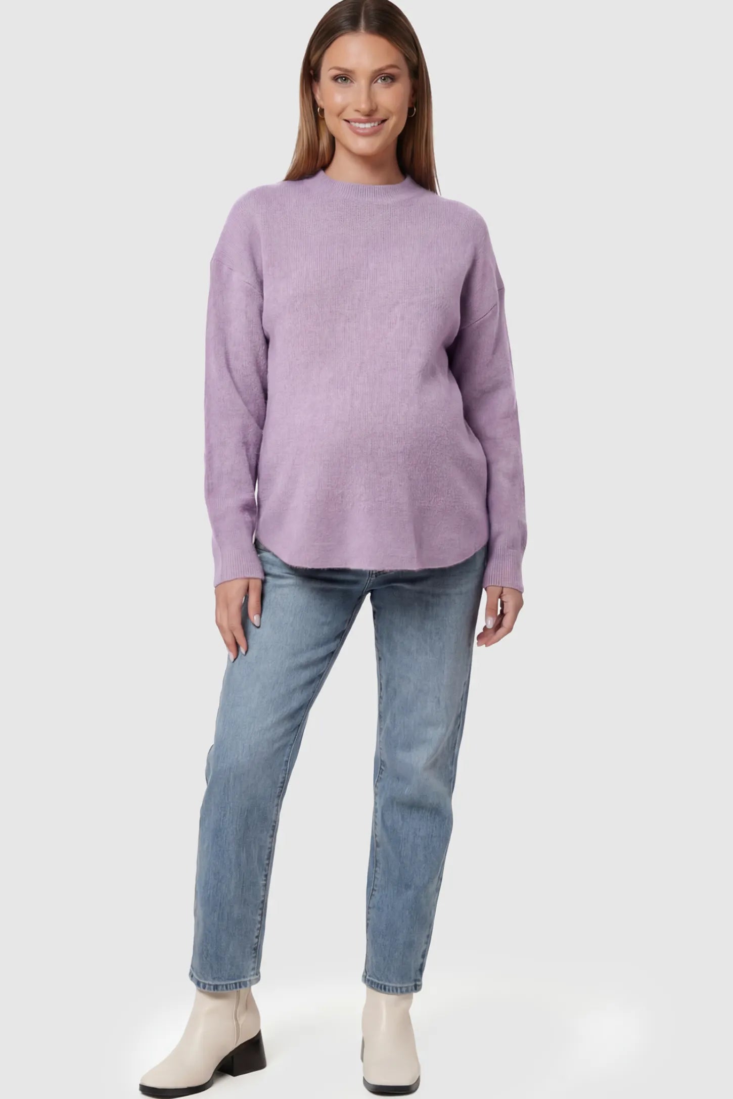 Mock Neck Long Sleeve Maternity Sweater Mock Neck Long Sleeve Maternity Sweater in Lavender thickened woolen fabric on a pregnant model.