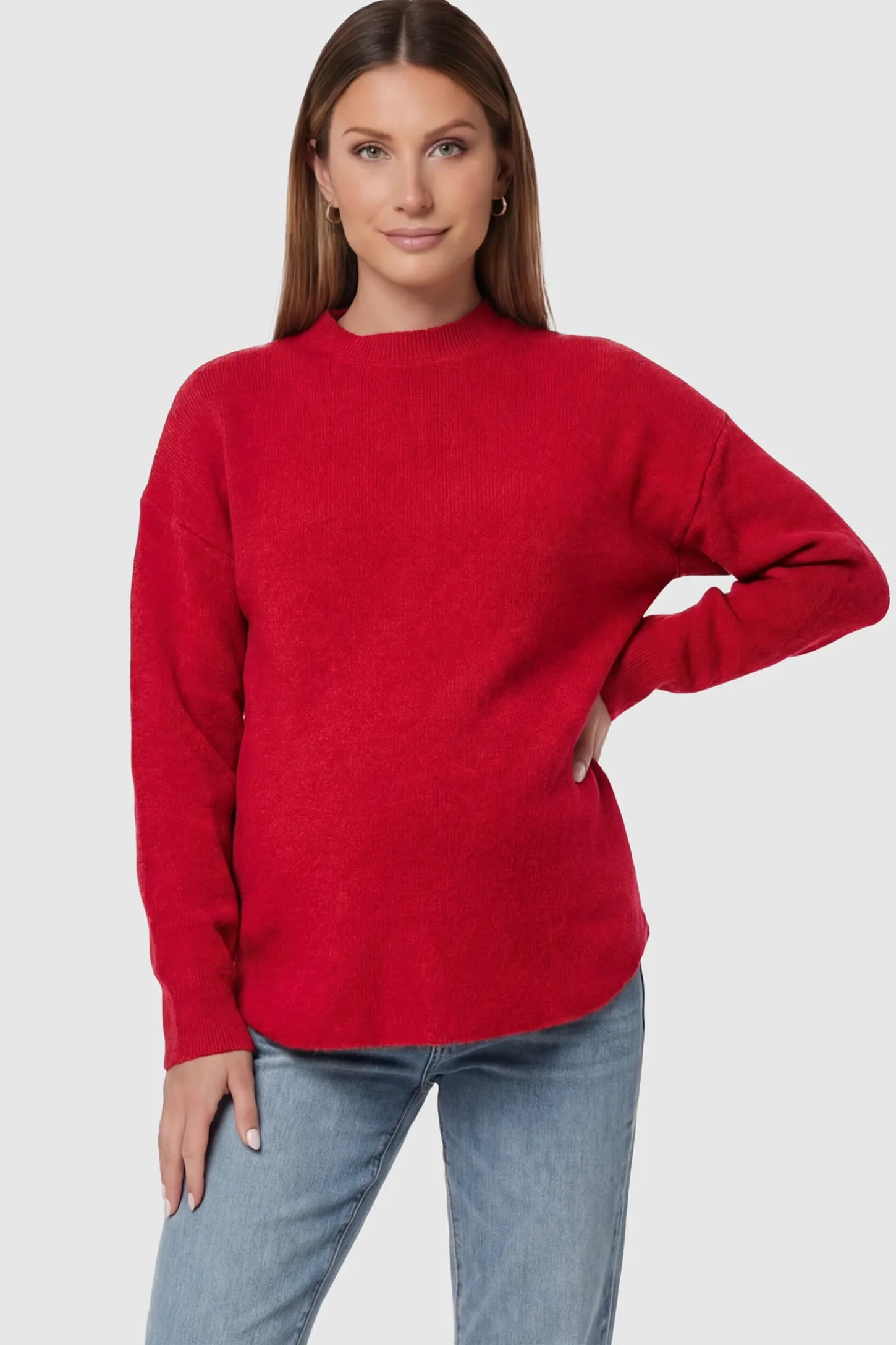 Mock Neck Long Sleeve Maternity Sweater Mock Neck Long Sleeve Maternity Sweater in Red thickened woolen fabric on a pregnant model.