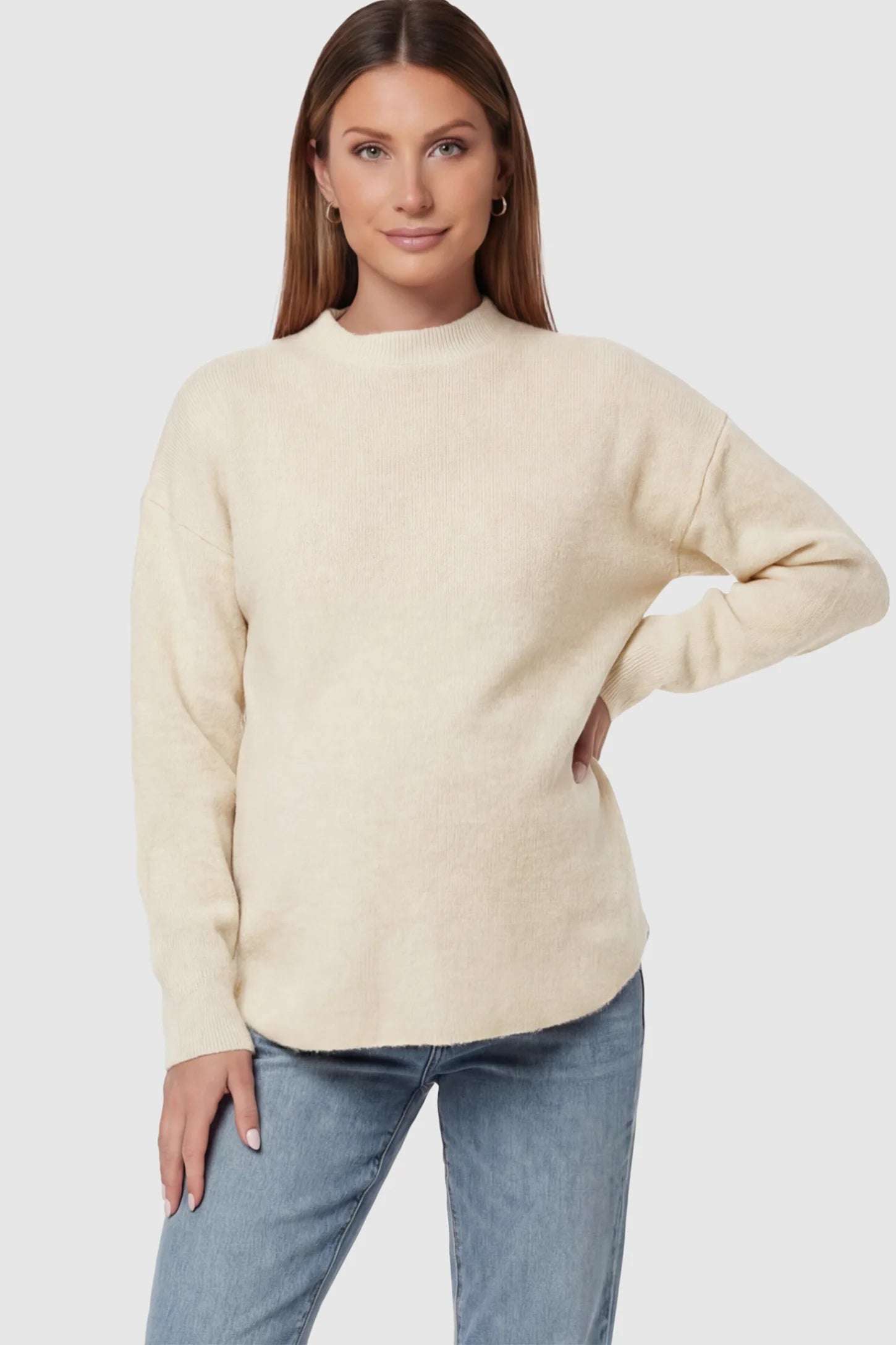 Mock Neck Long Sleeve Maternity Sweater Mock Neck Long Sleeve Maternity Sweater in White thickened woolen fabric on a pregnant model.