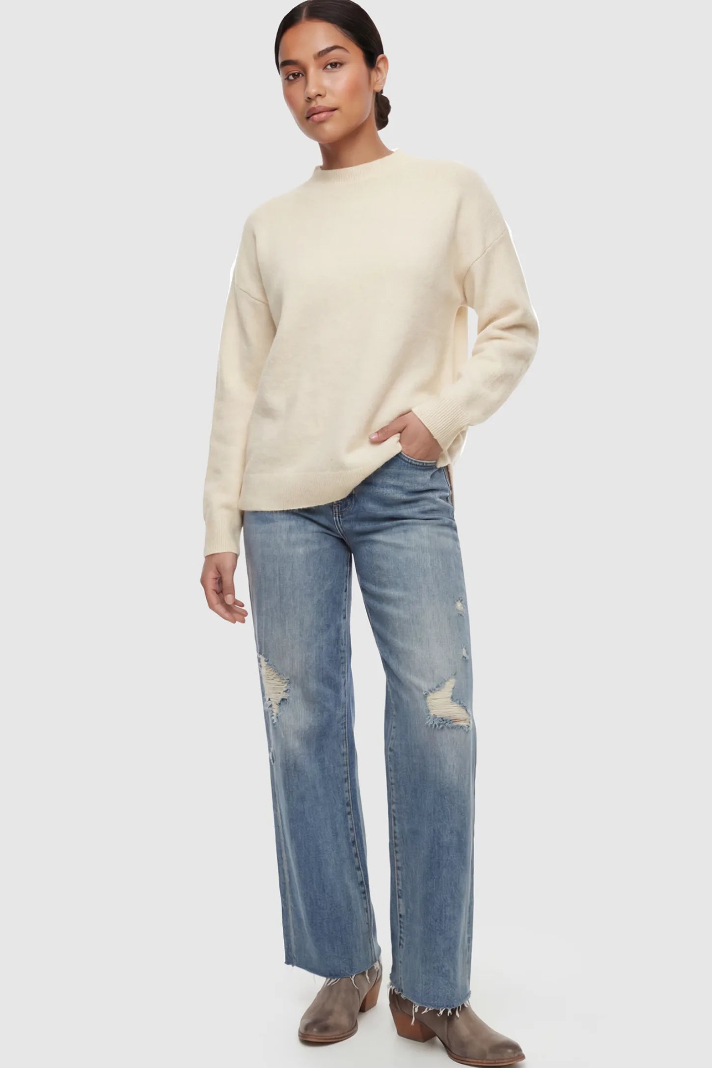 Mock Neck Long Sleeve Maternity Sweater Mock Neck Long Sleeve Maternity Sweater in White thickened woolen fabric on a postpartum model.