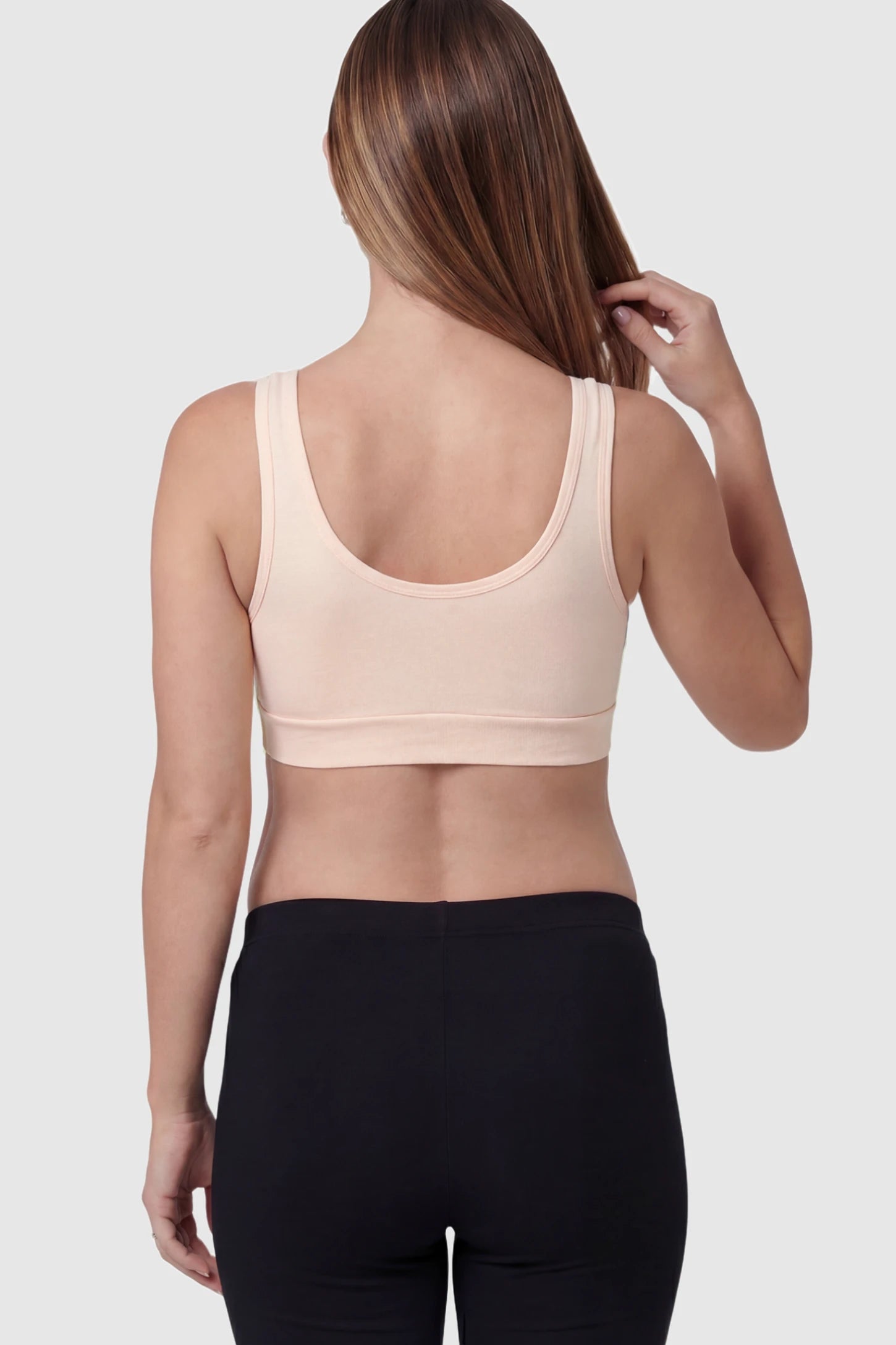 Soft Cotton Crossover Wireless Maternity Nursing Bra Soft Cotton Crossover Wireless Pull-On Maternity Nursing Bra in Shrimp Color on a pregnant model.
