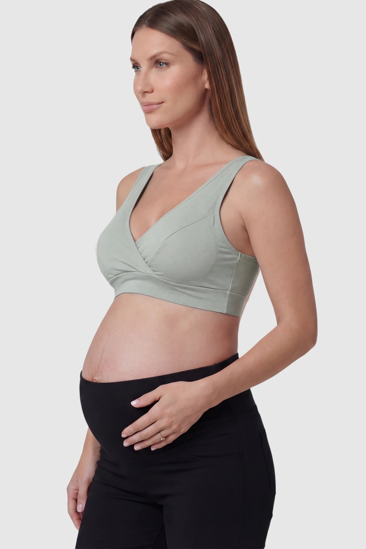 Soft Cotton Crossover Wireless Maternity Nursing Bra Soft Cotton Crossover Wireless Pull-On Maternity Nursing Bra in Gray featuring a wrap-front design on a pregnant model.