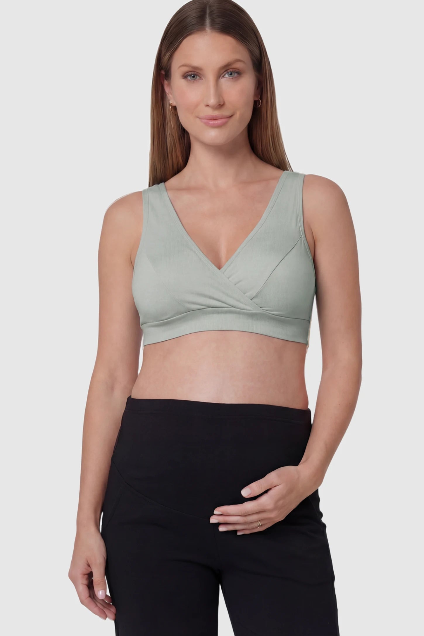 Soft Cotton Crossover Wireless Maternity Nursing Bra Soft Cotton Crossover Wireless Pull-On Maternity Nursing Bra in Gray featuring a wrap-front design on a pregnant model.
